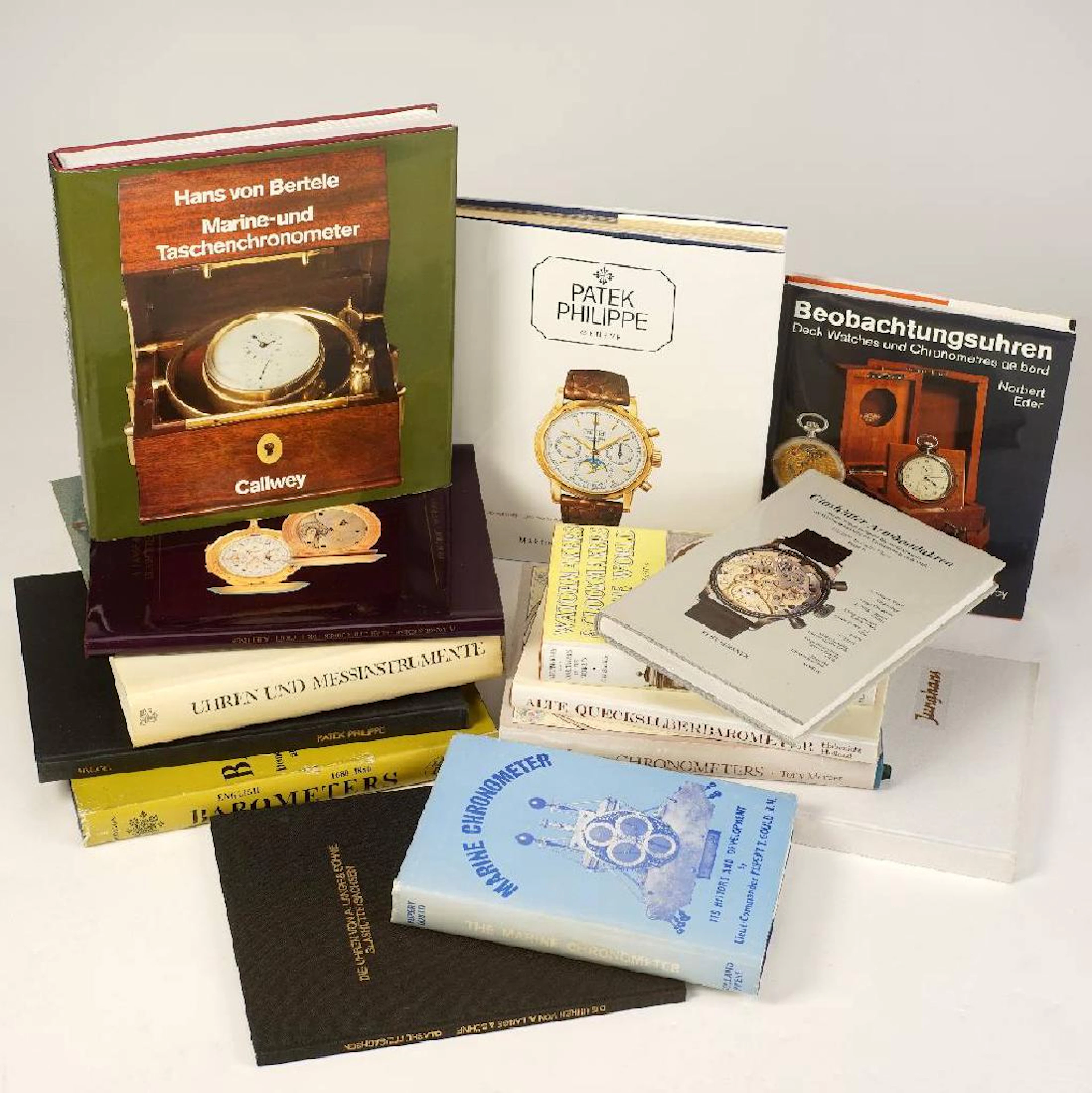 Set of 12 watch books & 2 barometer books