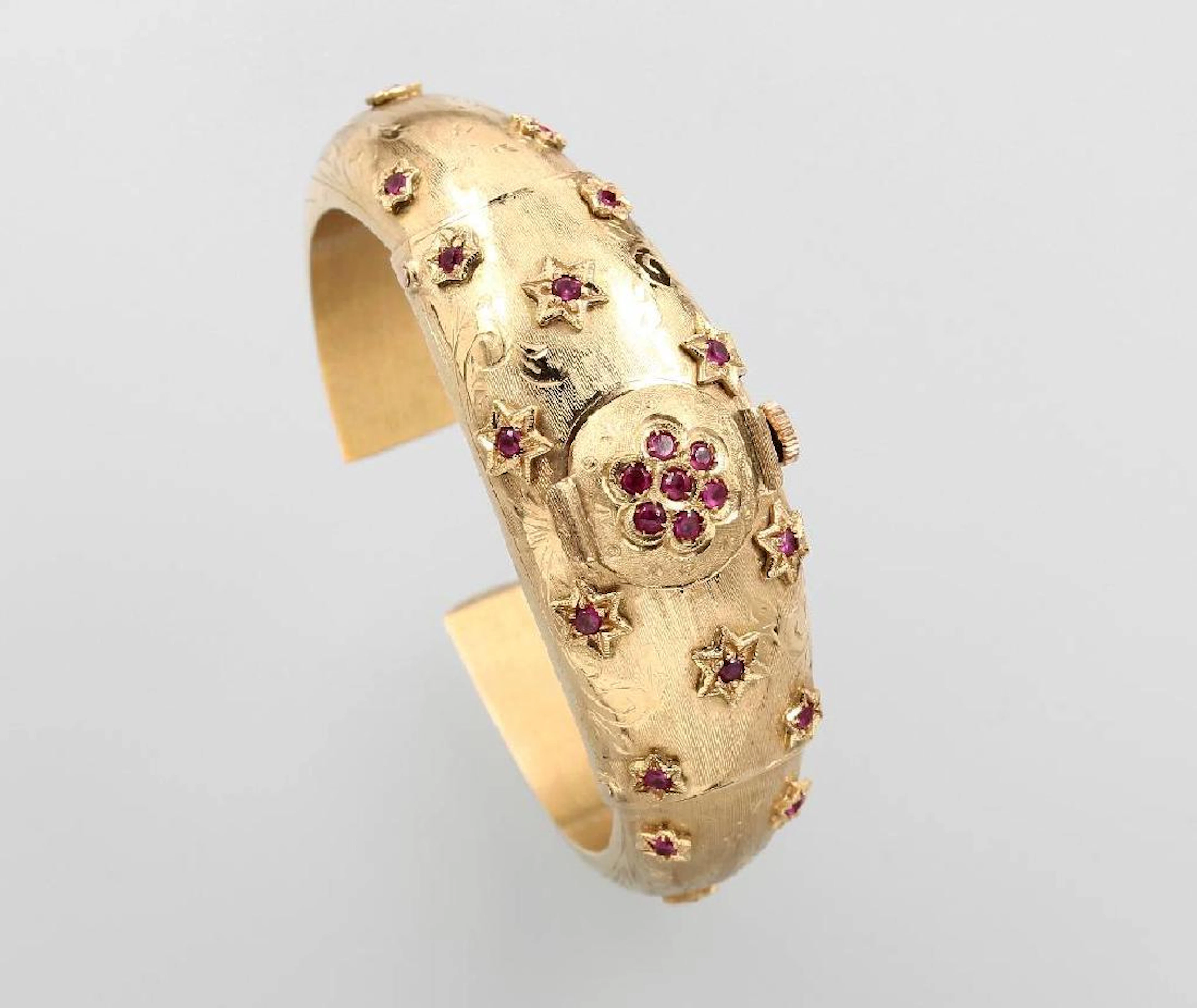 18 kt gold bangle with embedded watch
