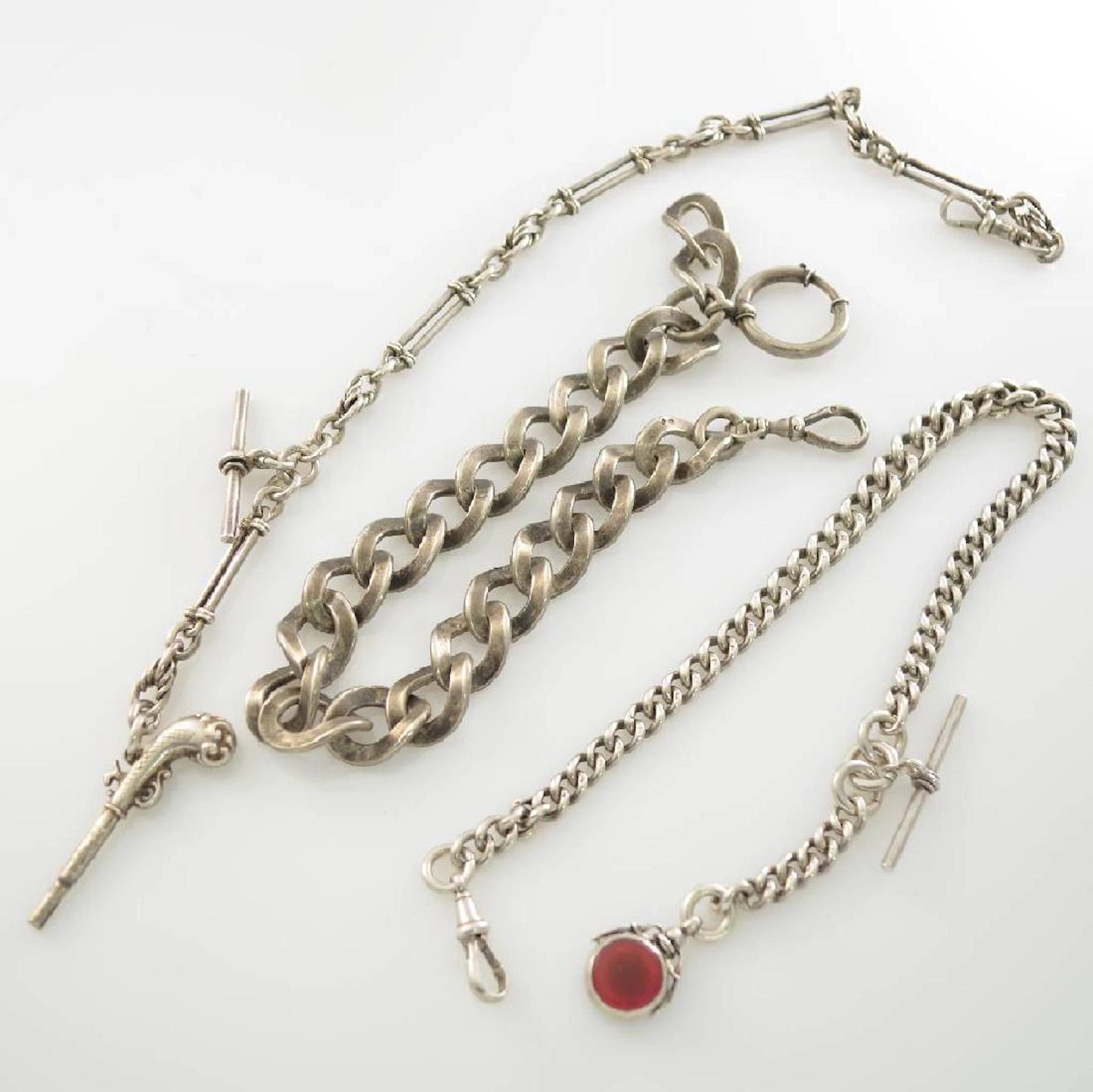 Set of 3 heavy silver pocket watch chains, around 1880