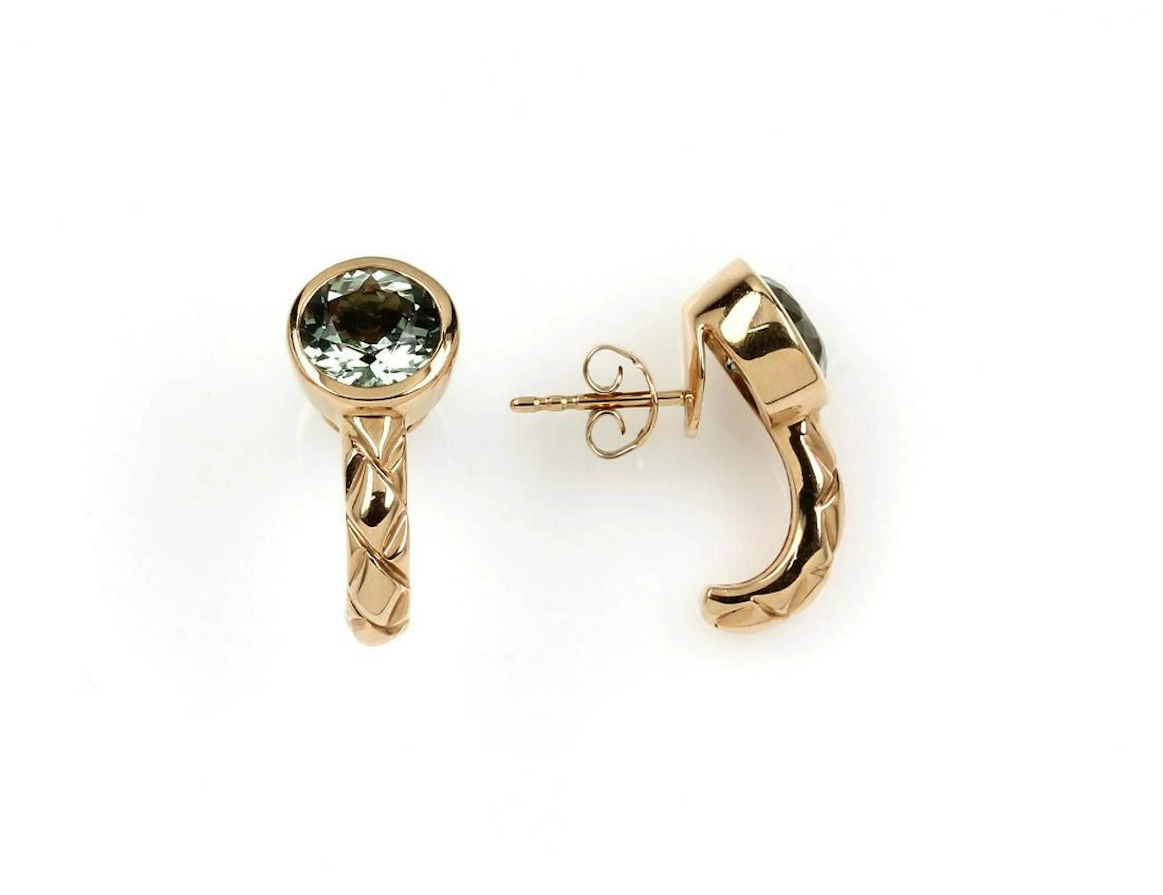 Pair of 18 kt gold earrings with green ametrines