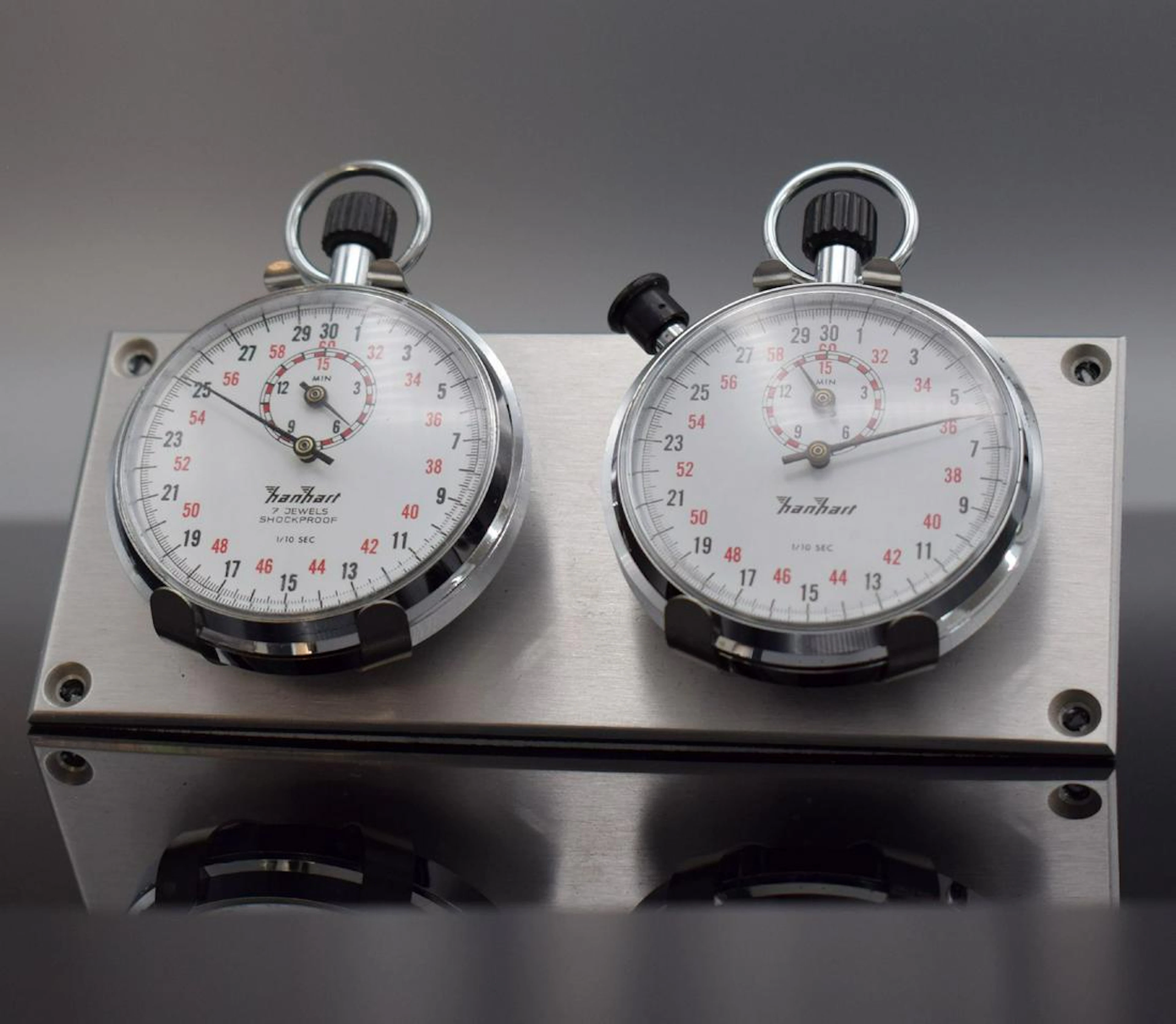 2 HANHART stop watches on aluminium plate for