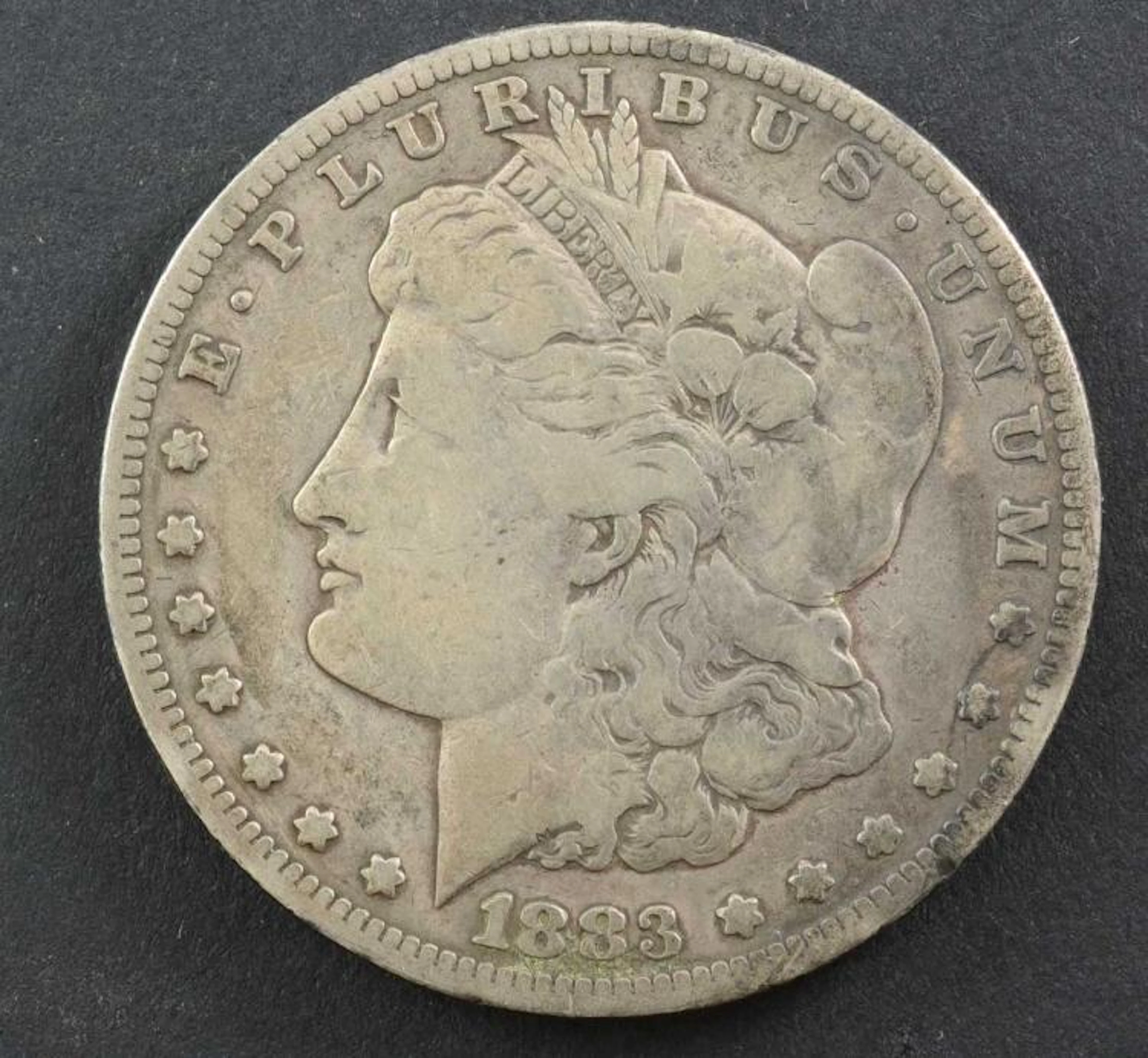 1883-CC Morgan US Silver Dollar