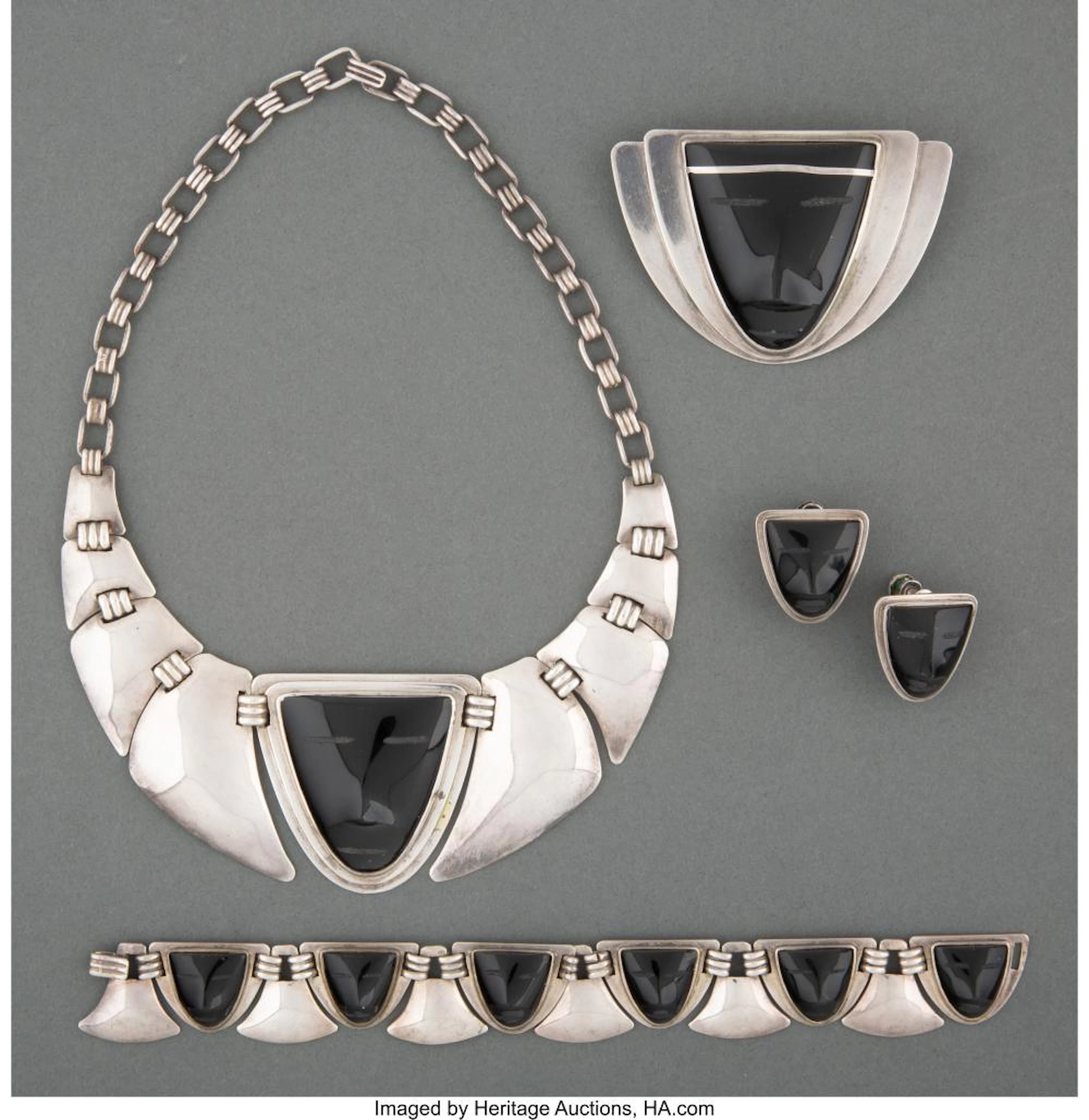 Frederick Walter Davis (American, 1880-1961) Jewelry Suite, circa 1945 Silver, o