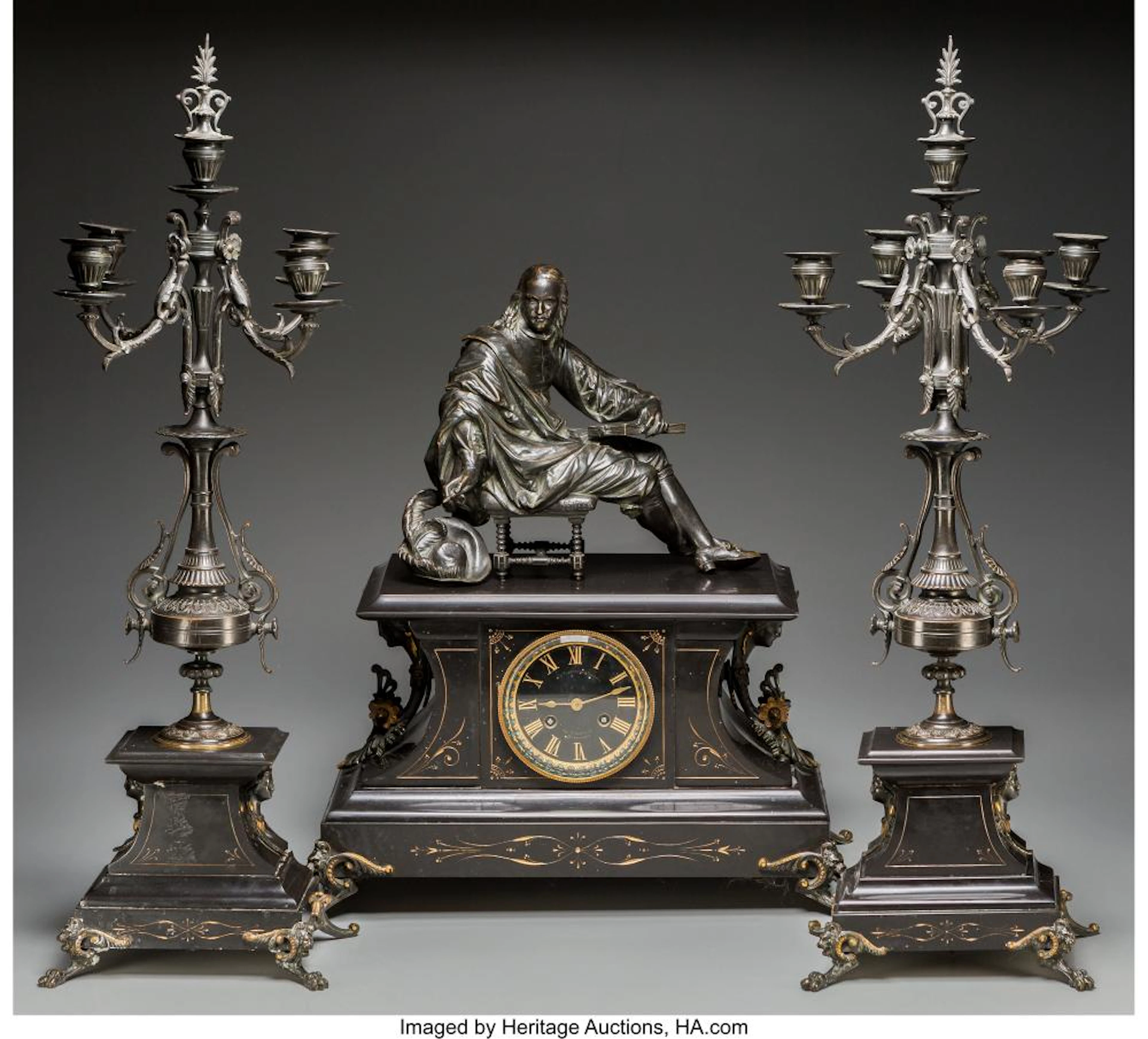 A French Renaissance Revival Patinated Bronze and Slate Clock Garniture, late 19