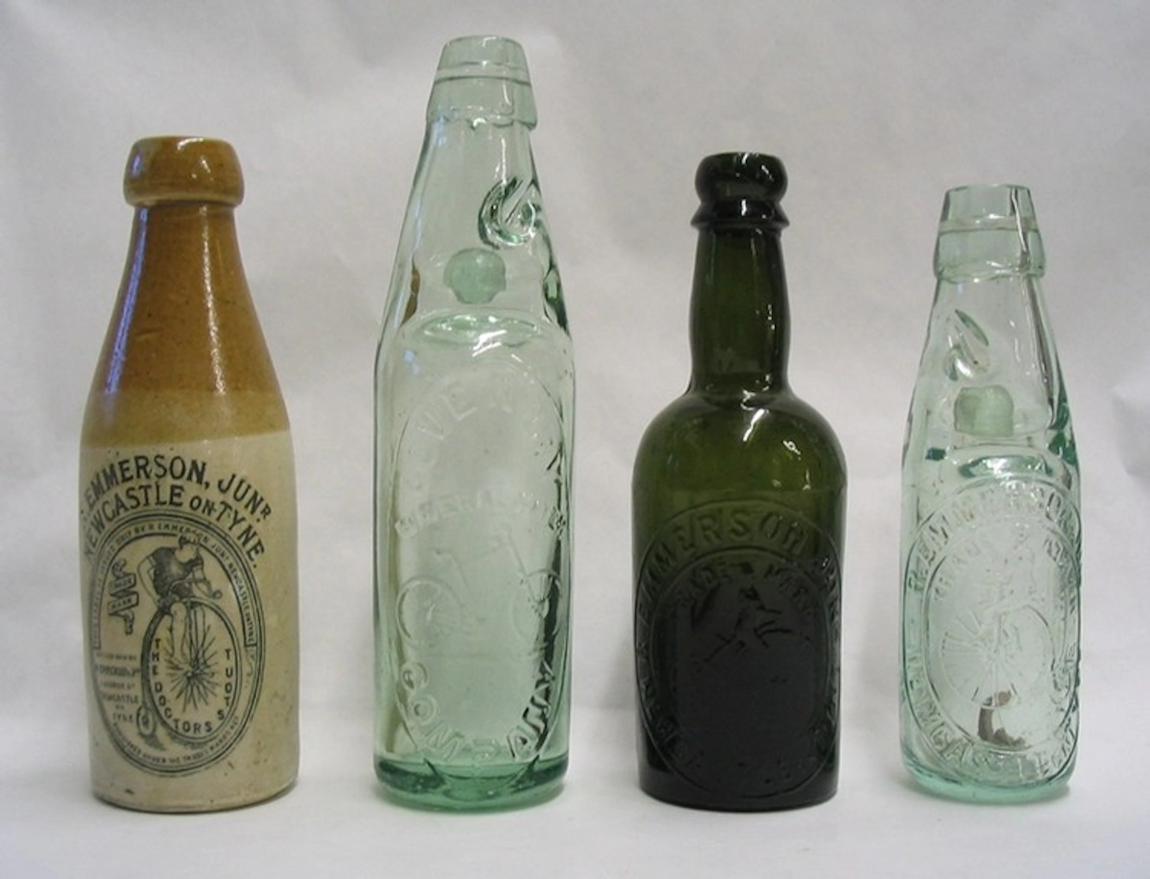 Collection (4) bottles with bicycle motif