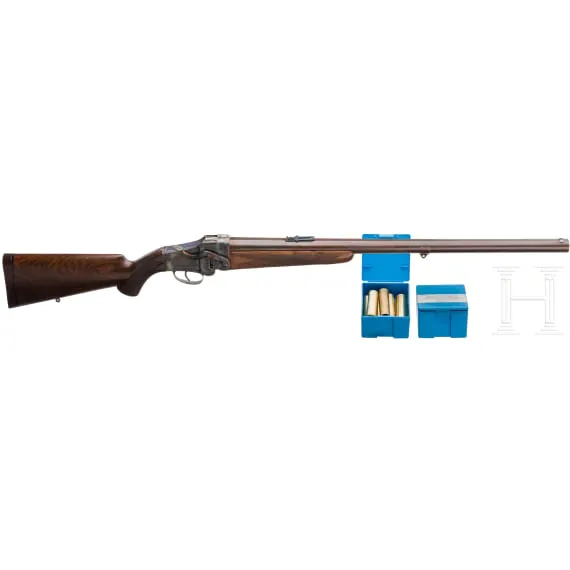 An English single shot rifle by Rigby, vertical falling block | Barnebys