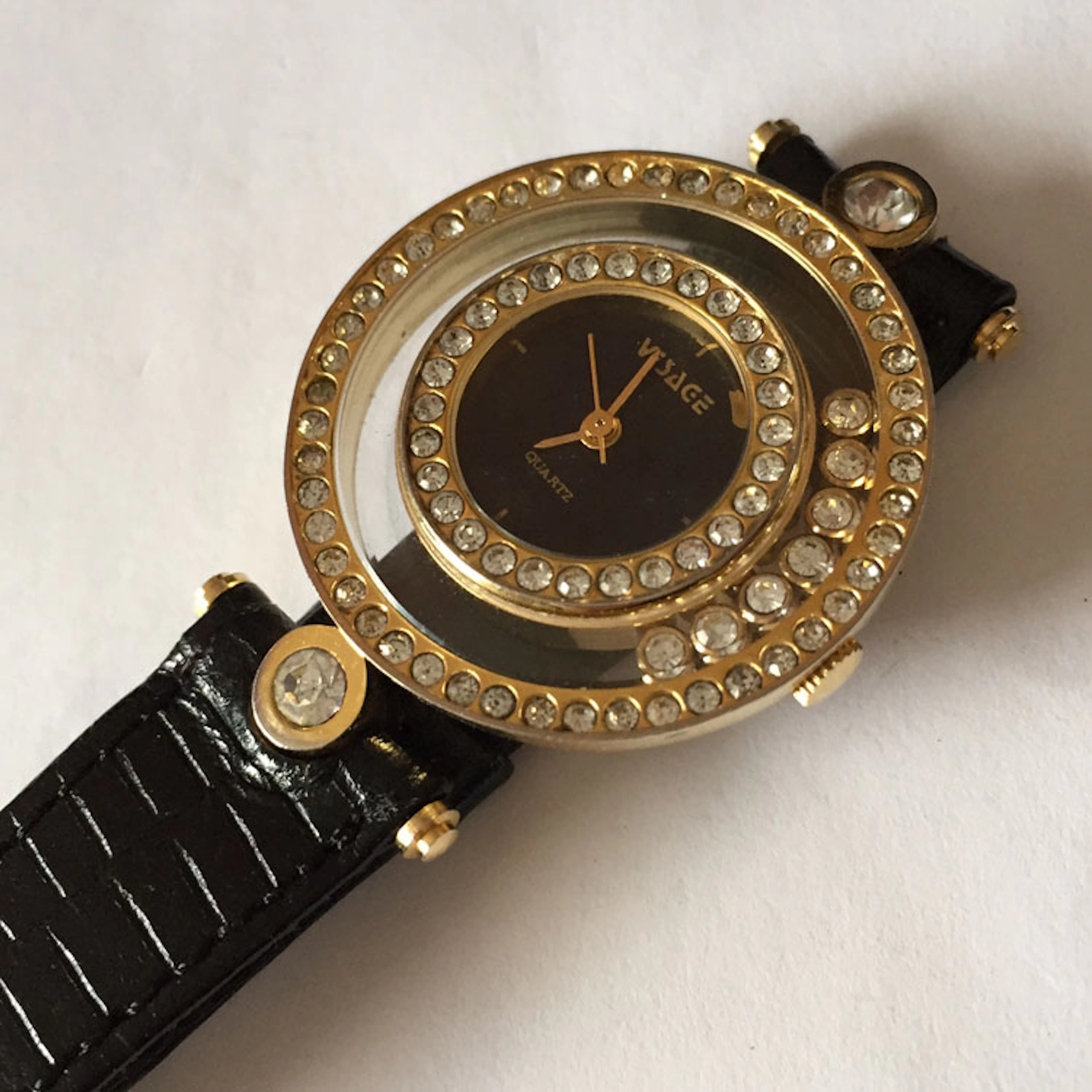 Gold plated round shape VISAGE Quartz watch with floating...