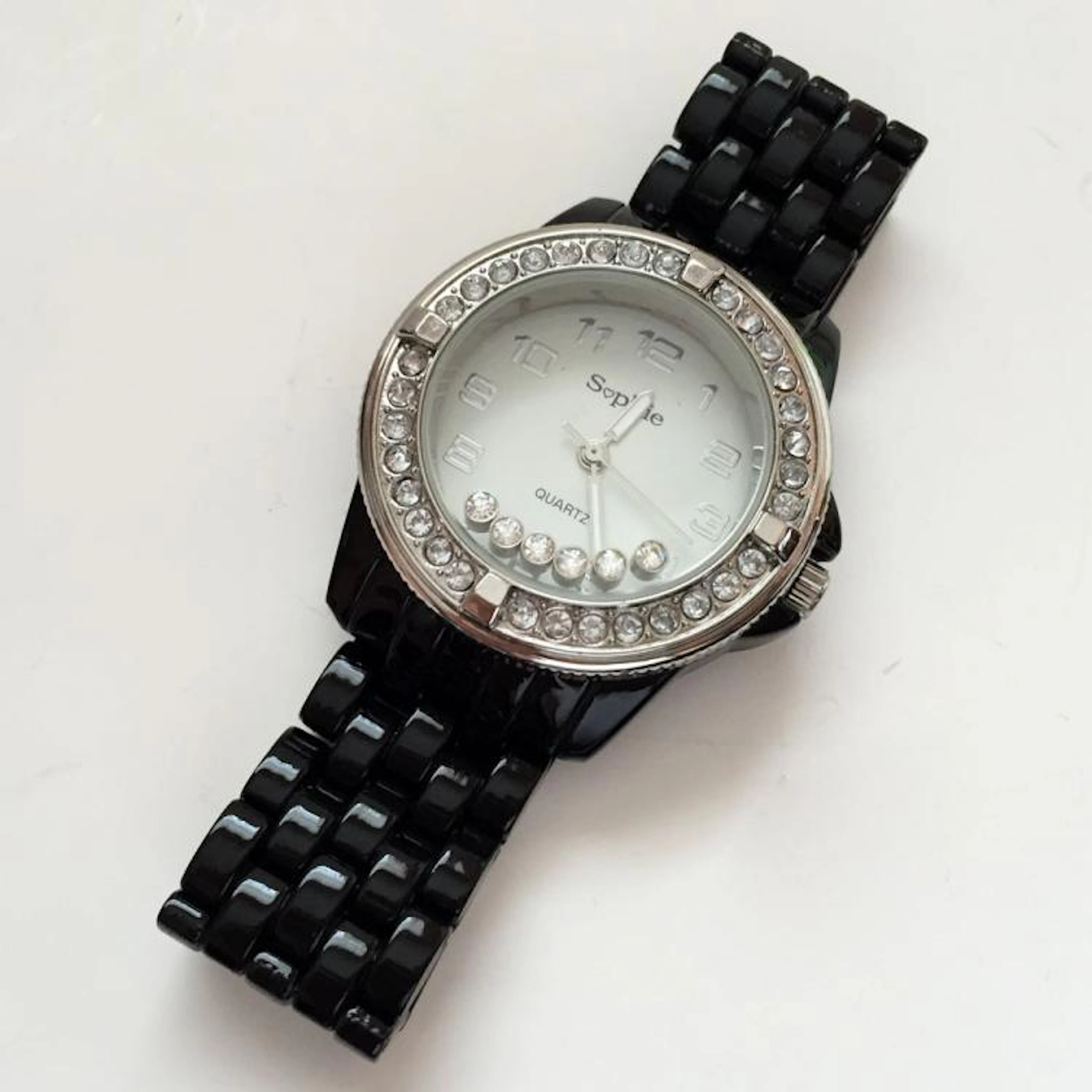 Ladies SOPHIE watch with moving crystals on top of dial and rhinestones bezel