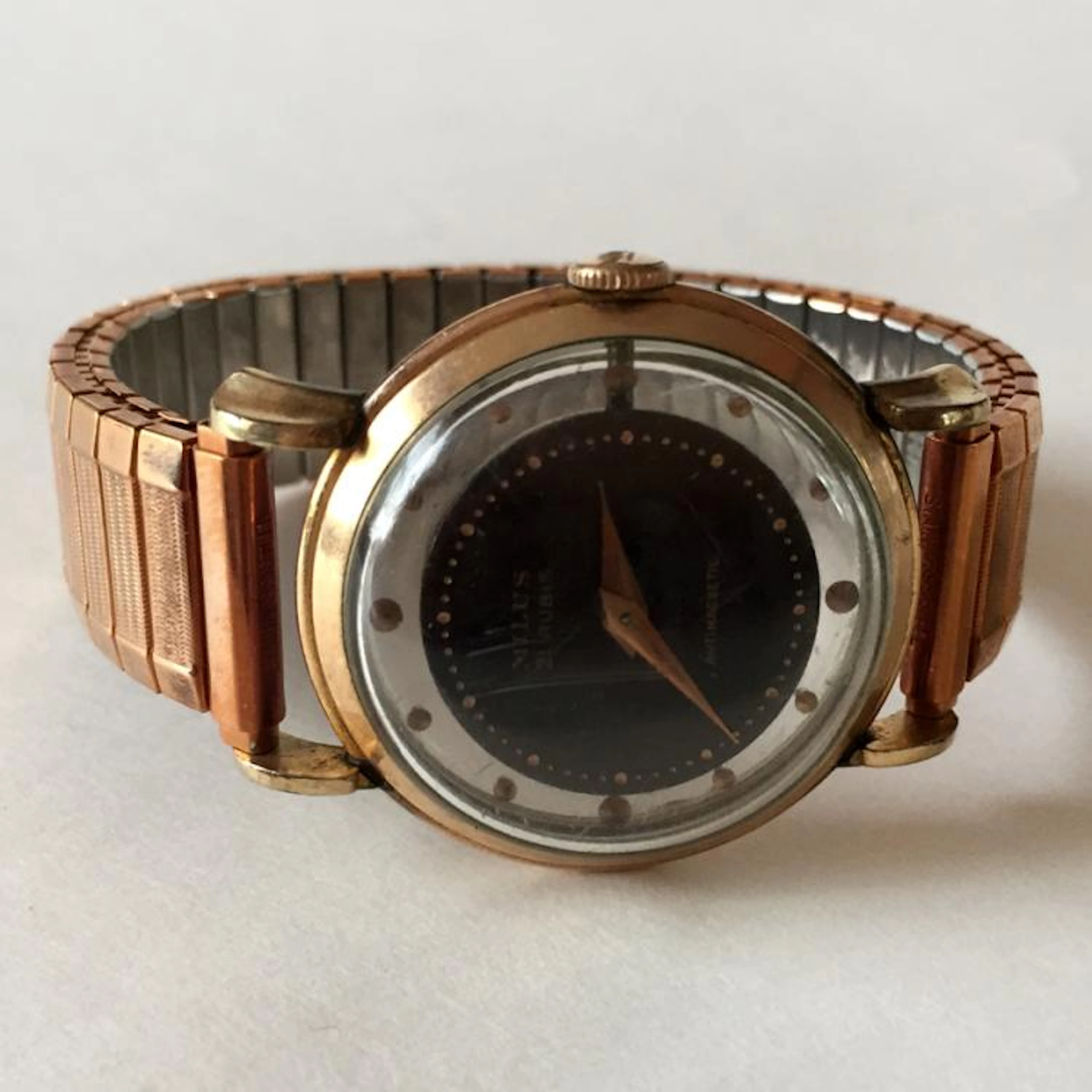 Vintage pink tone round MILUS 21 Rubies Swiss Skeleton...
