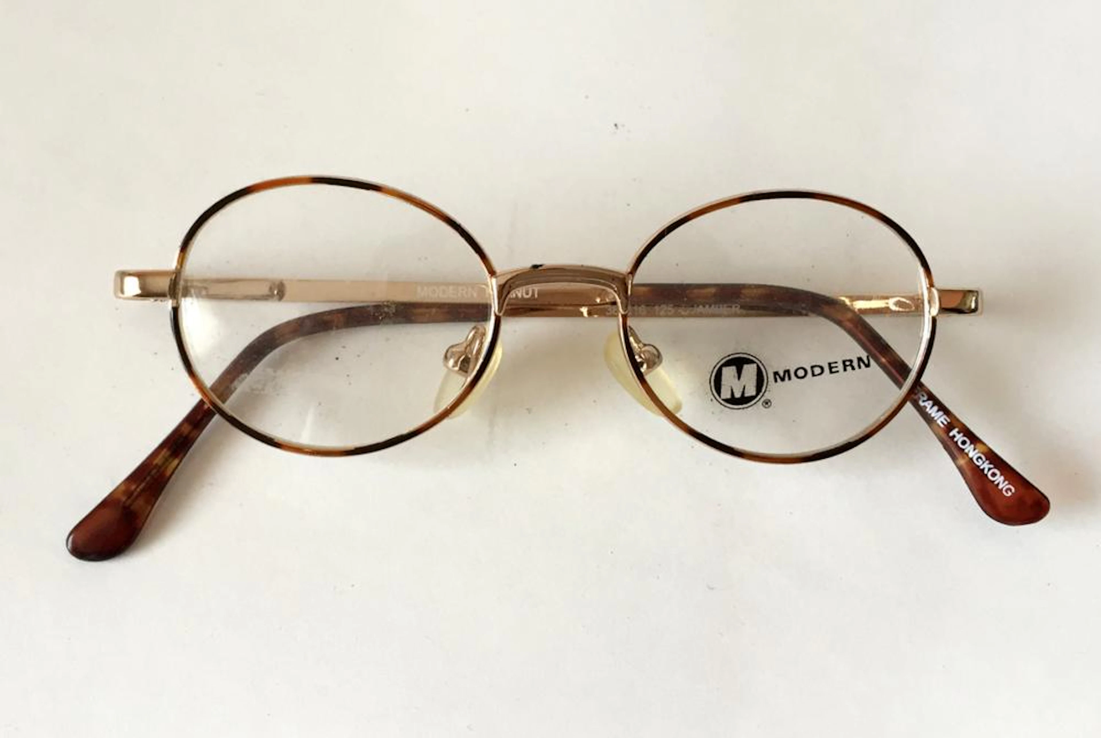 Vintage MODERN PEANUT eyeglasses. D/Amber color, size 38-16-125
