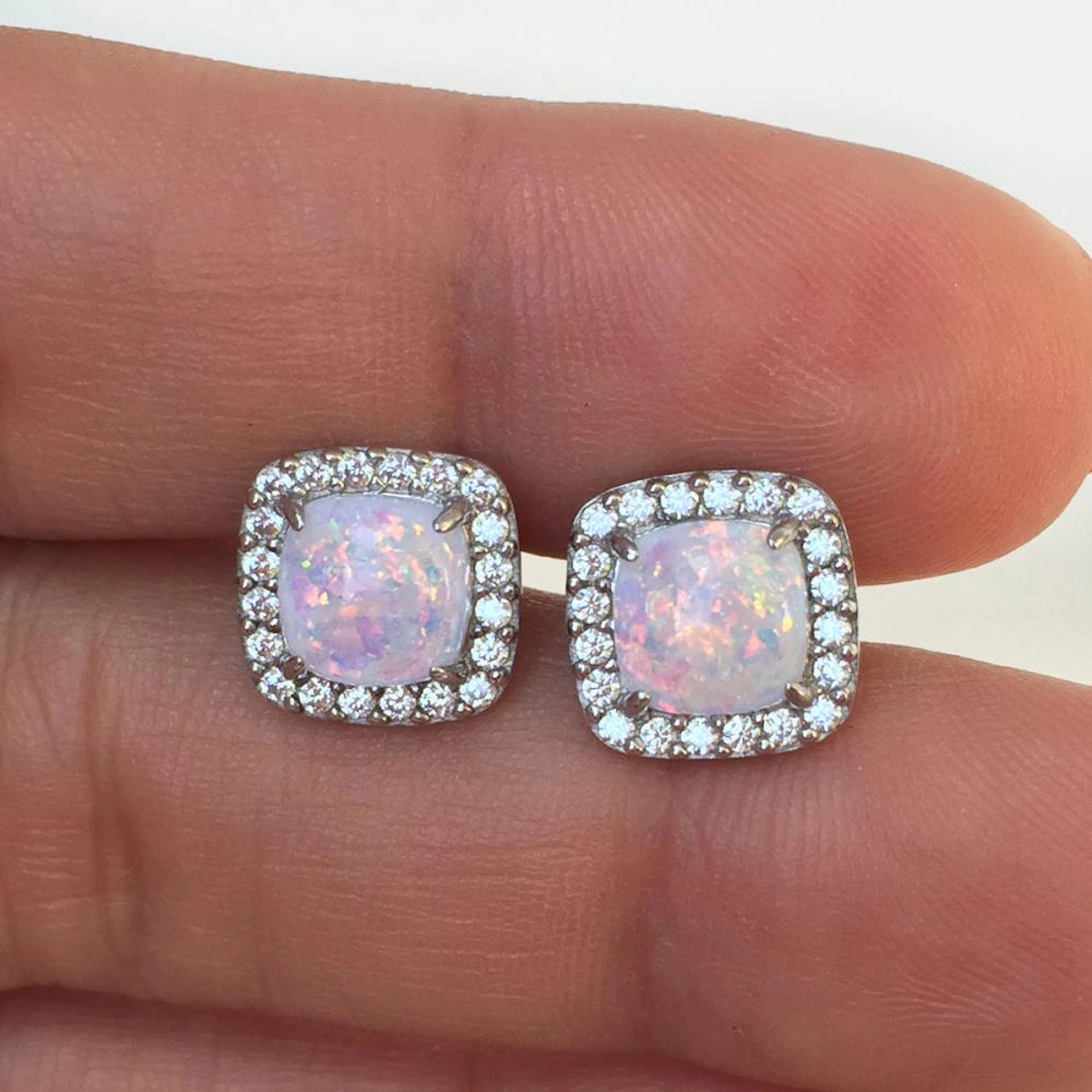 DIAMONIQUE: Sterling silver cushion shape opal color...