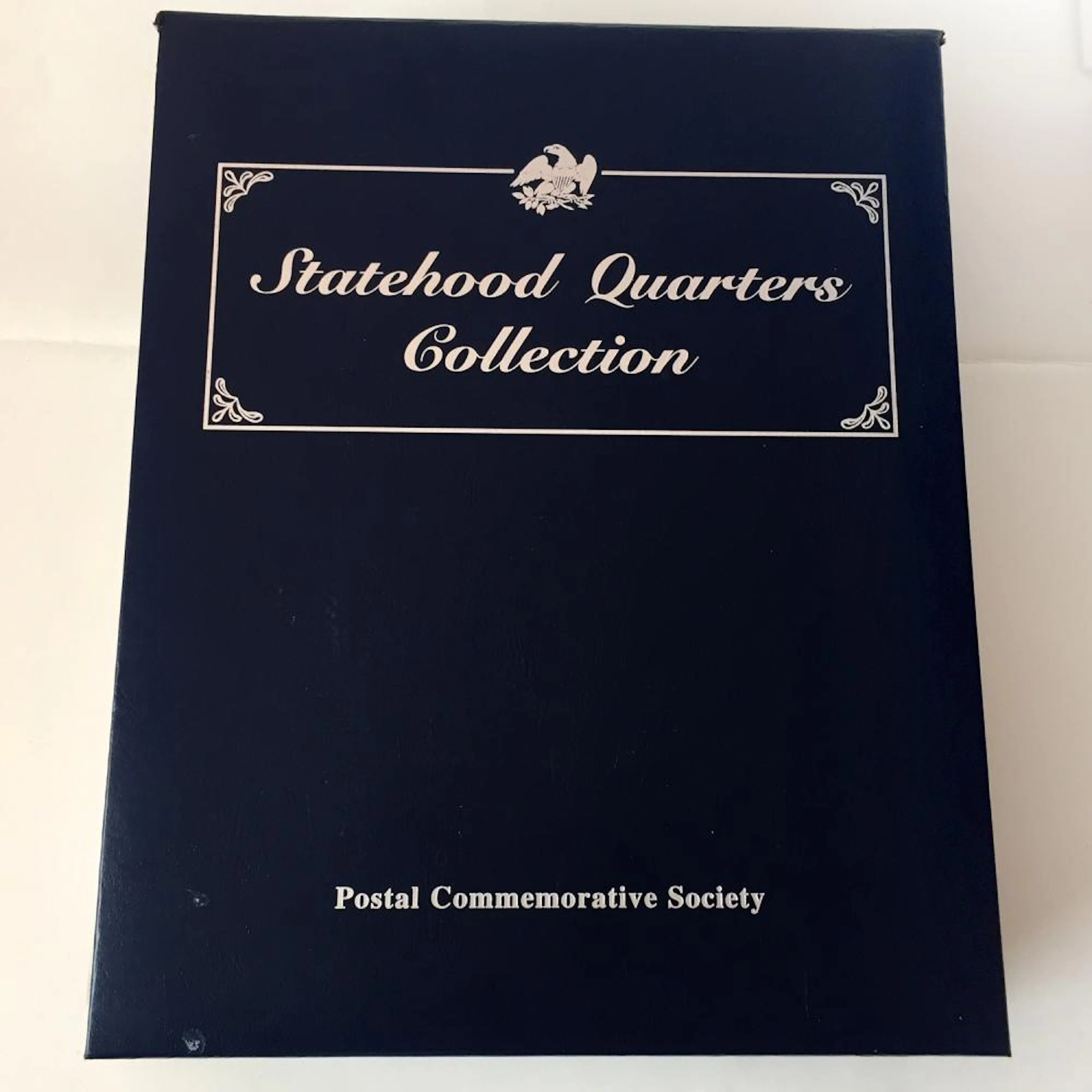 Vintage "Statehood Quarters Collection" album issued by...