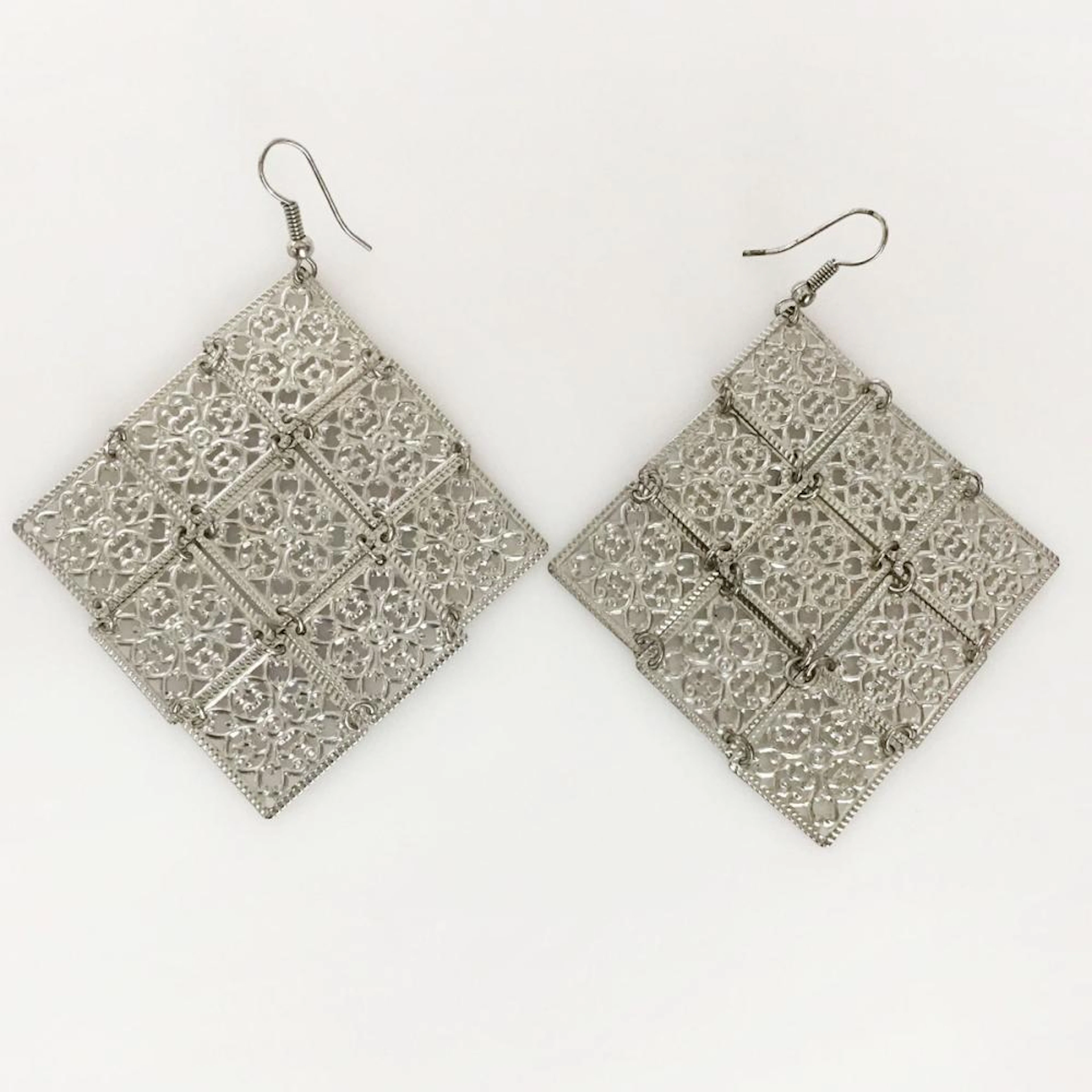 Silver tone fish hook chandelier earrings