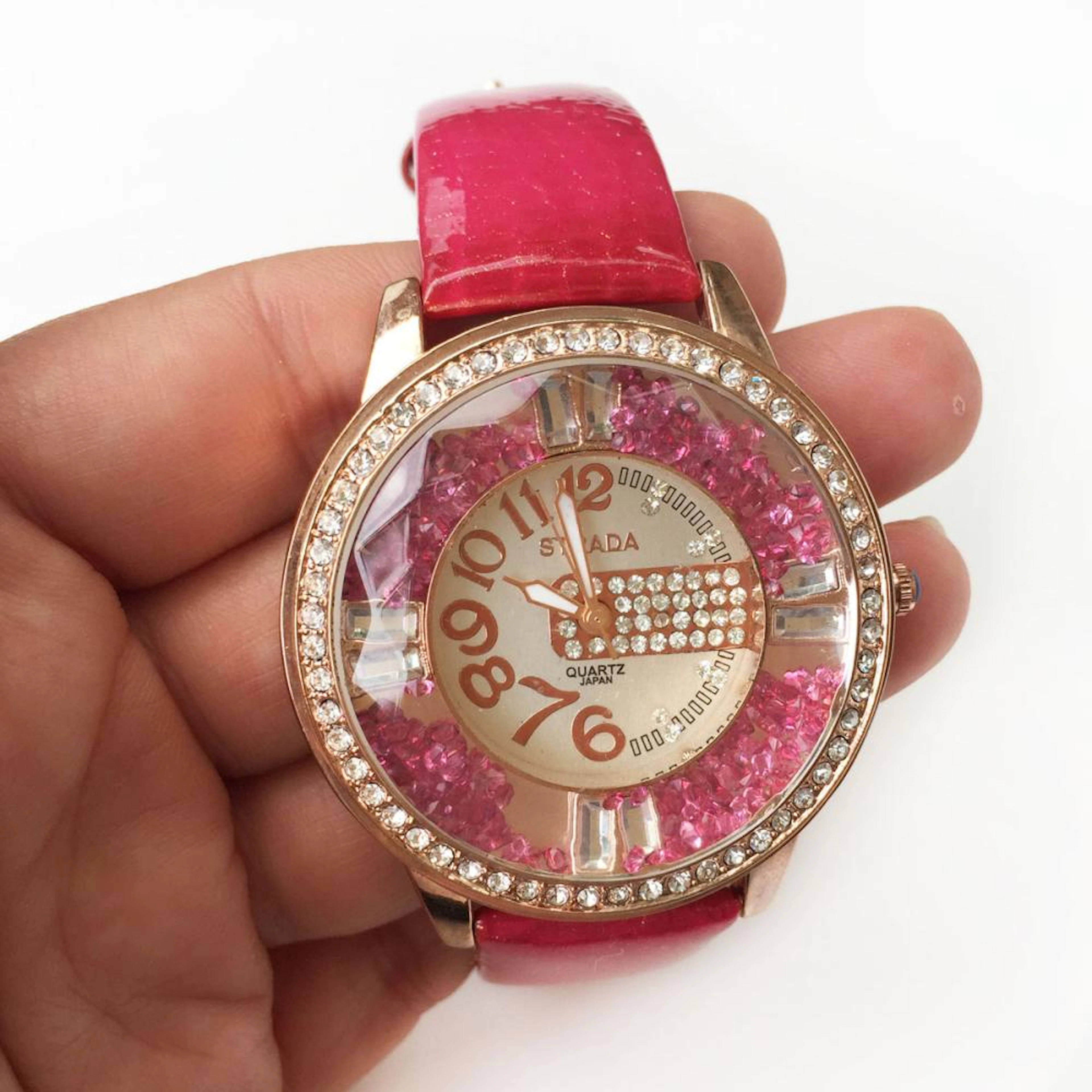 STRADA: 18K Rose gold IP plating hot pink crystals and sparkly band watch