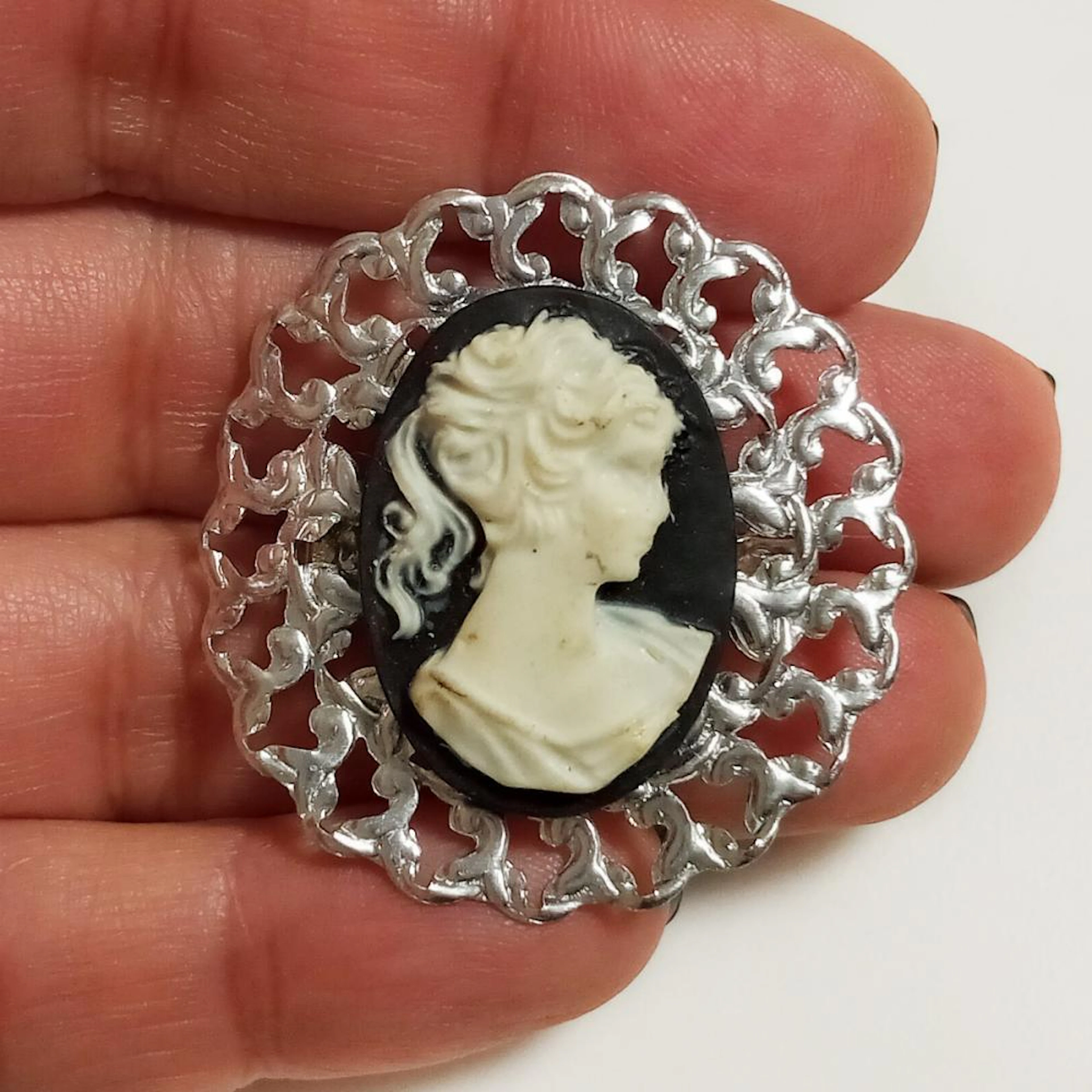 Silver tone textured finish Woman's face Cameo oval shape brooch