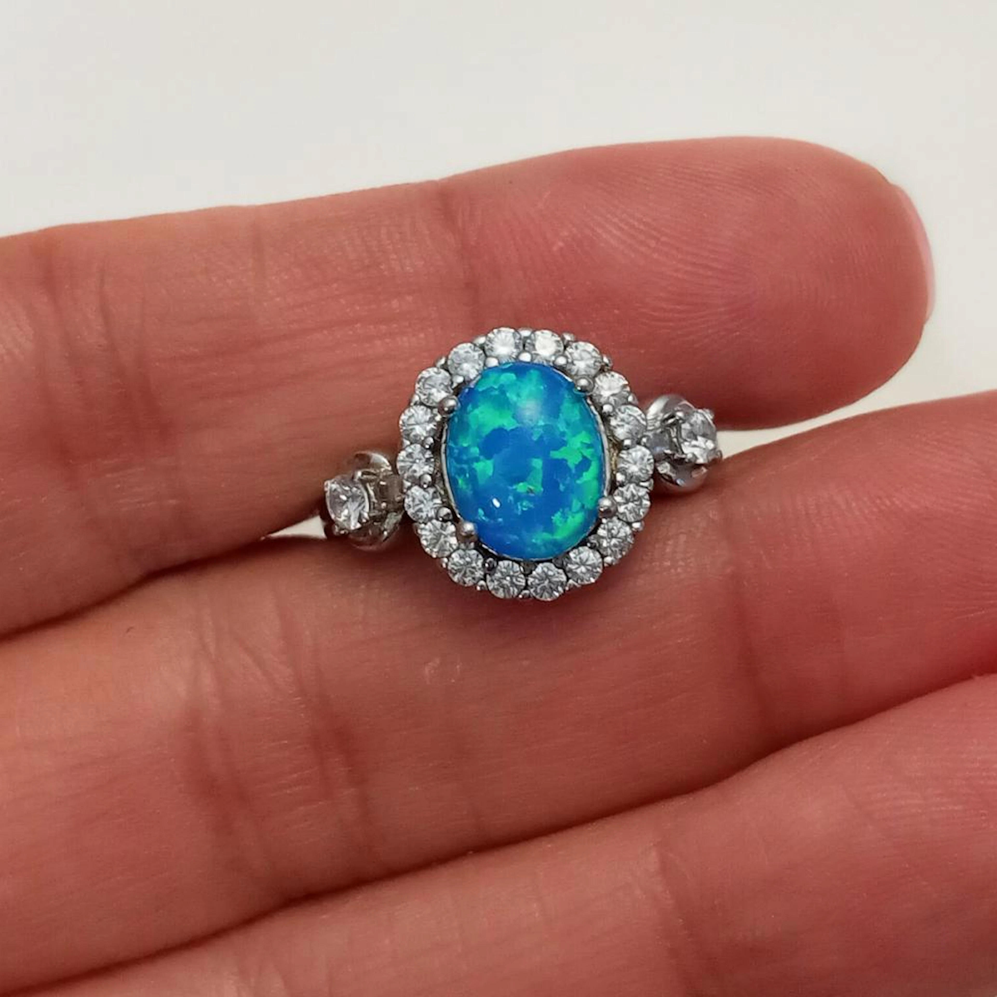 Sterling silver clear CZ, oval shape Opal color cabochon ring, size 6 1/2