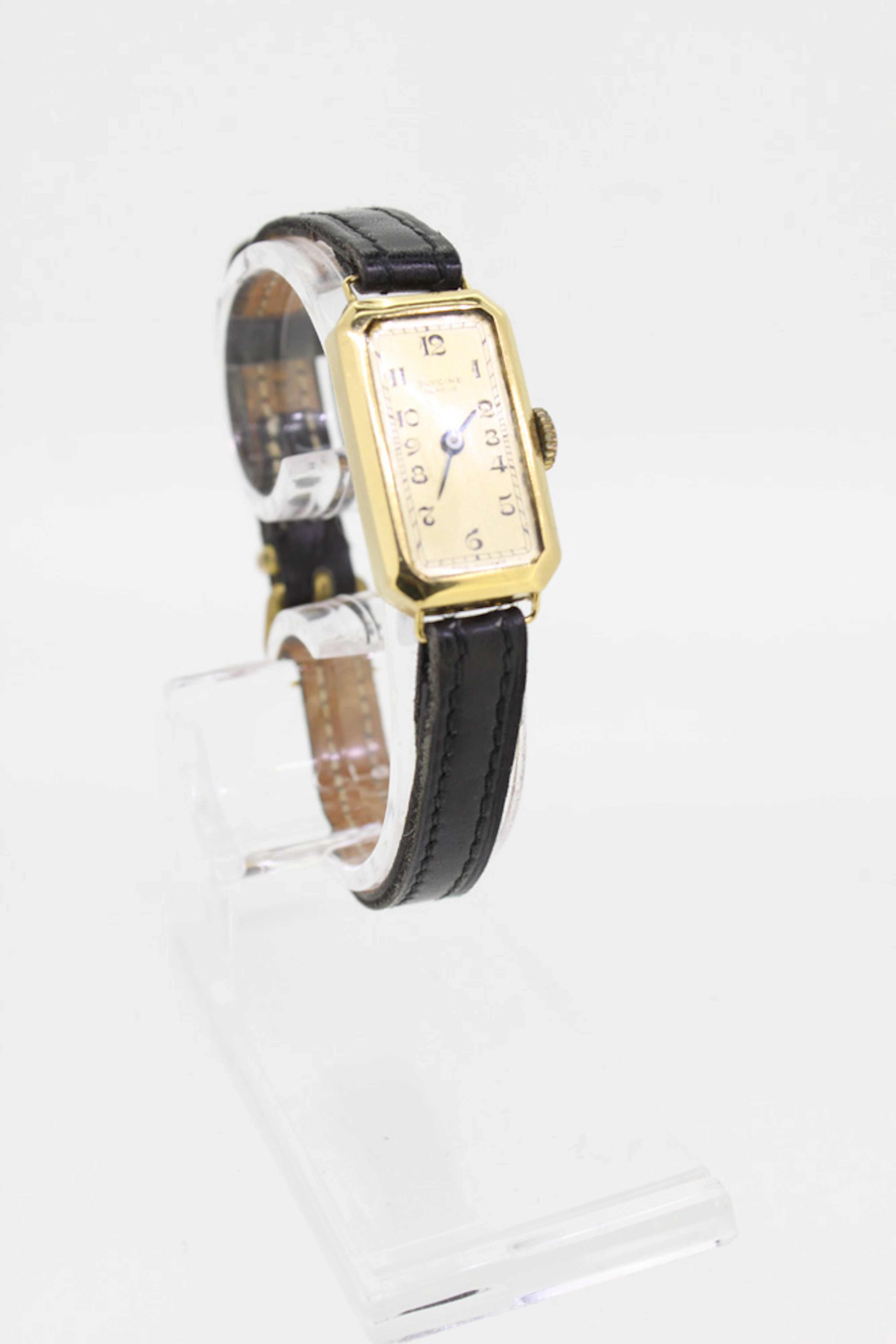 Montre rectangulaire signée Glycine en or 750, mécanique