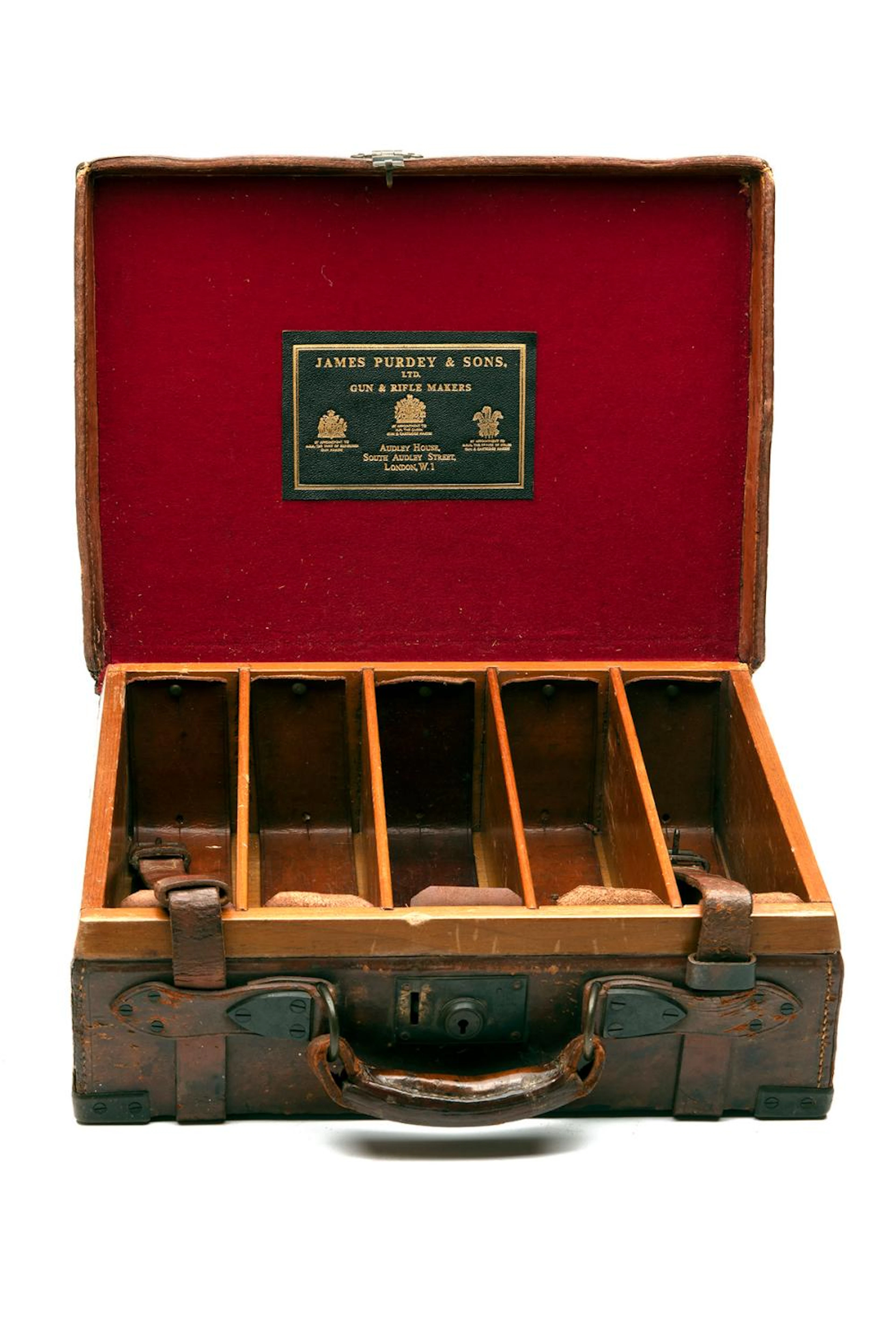 A BRASS-BOUND OAK AND LEATHER CARTRIDGE MAGAZINE,