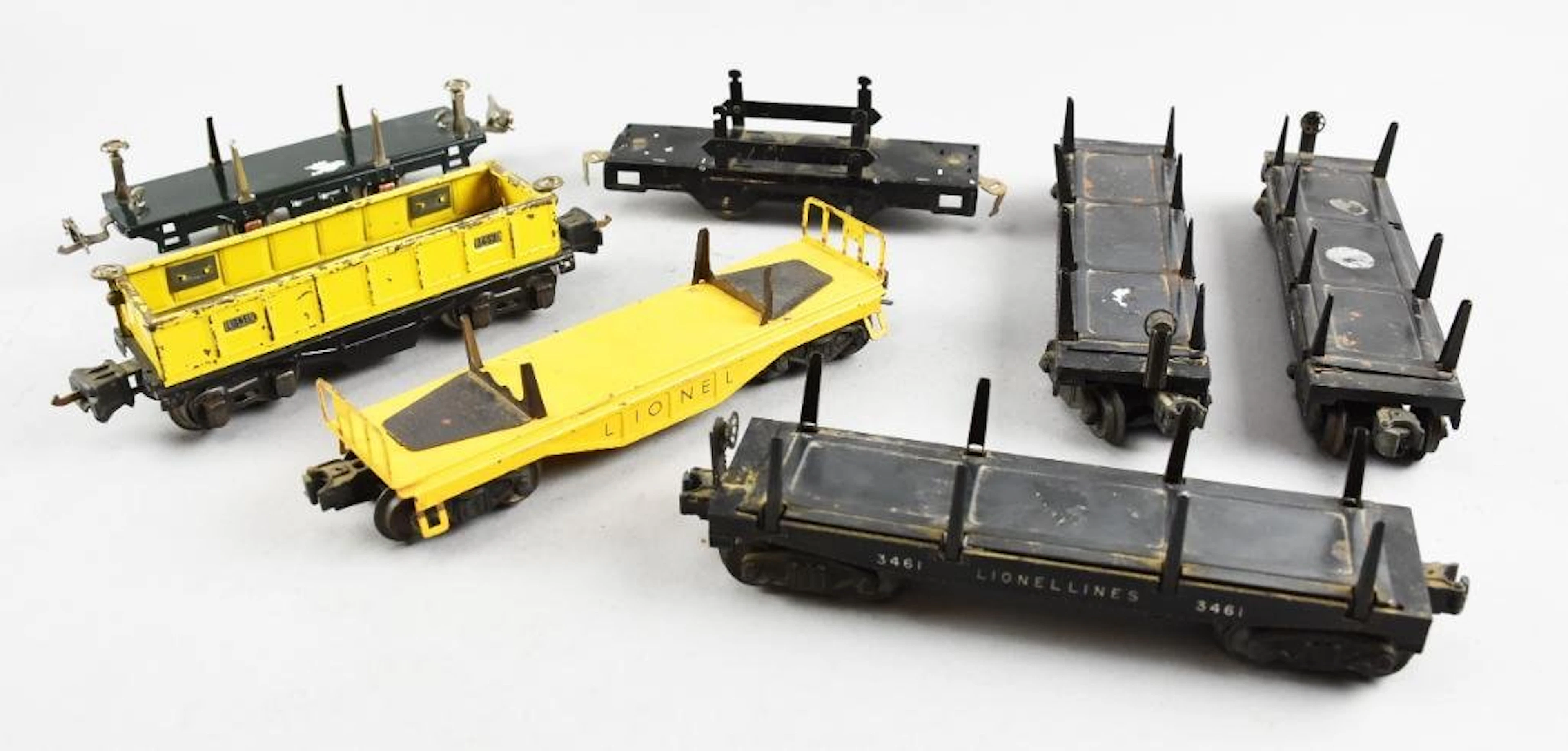 (7) Pre-War Lionel Lumber, Flat and Gondola Cars