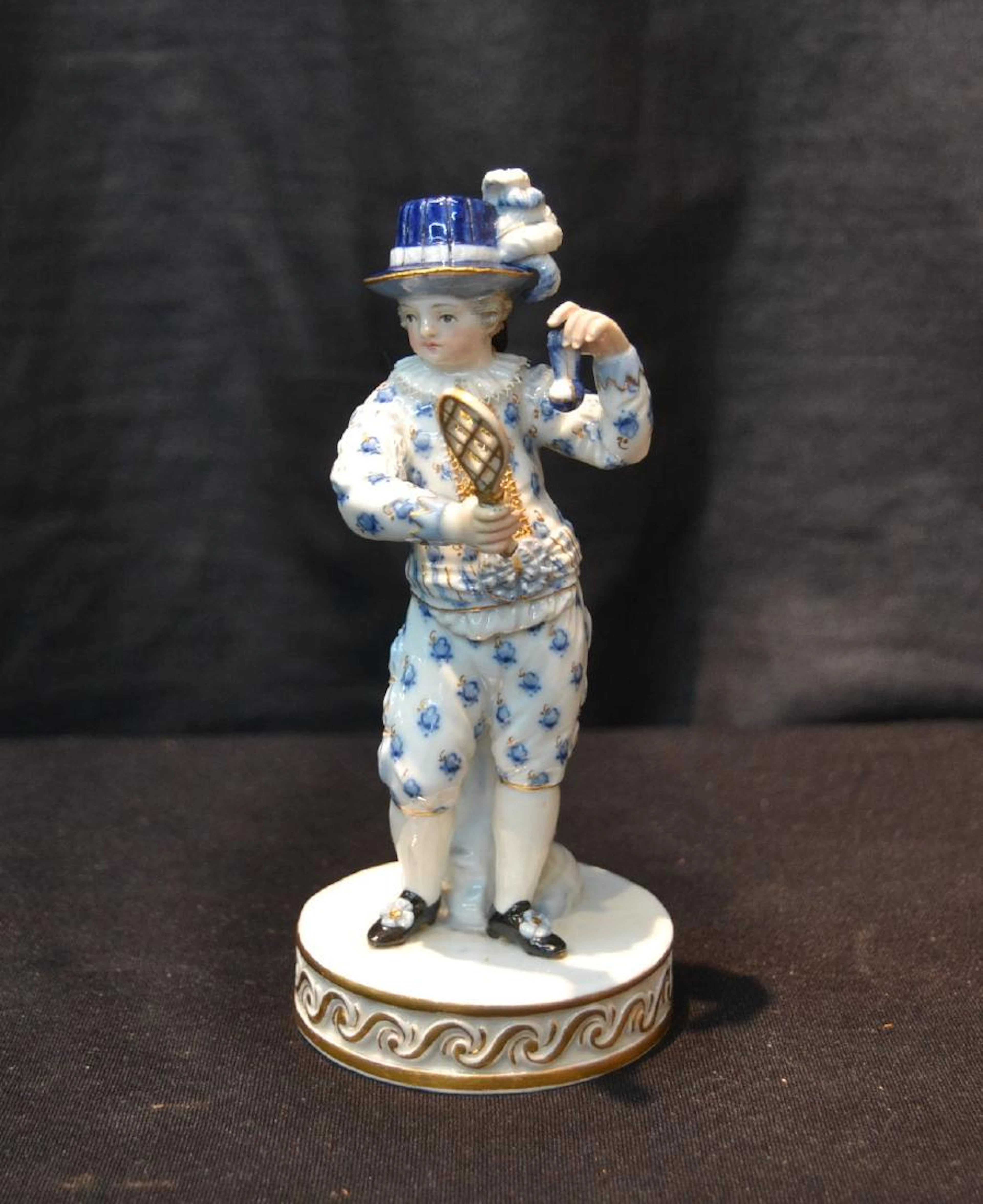Meissen porcelain boy with racquet