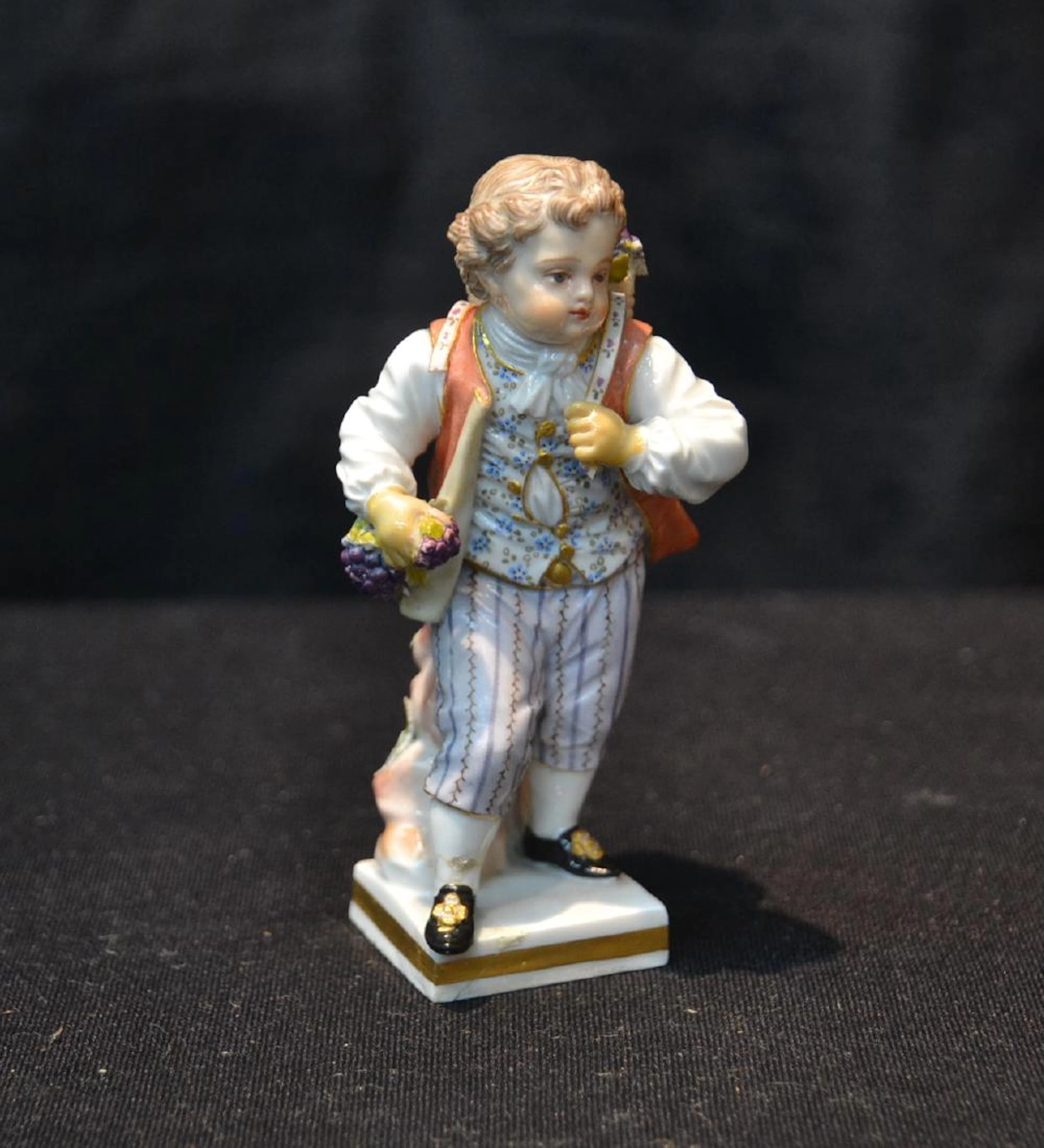 Meissen porcelain boy with back pack
