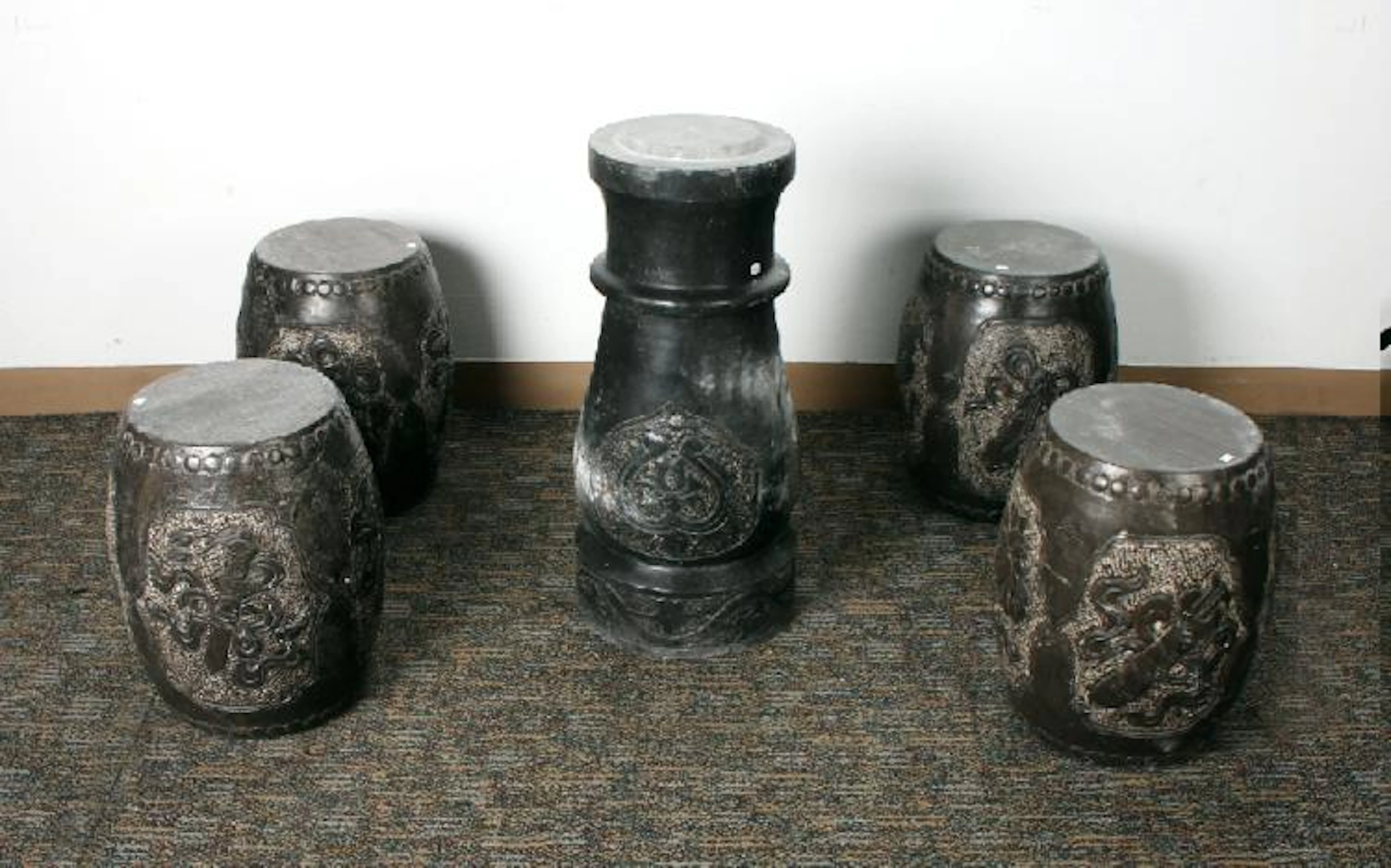 GARDEN SET OF FOUR STONE STOOLS WITH PEDESTAL