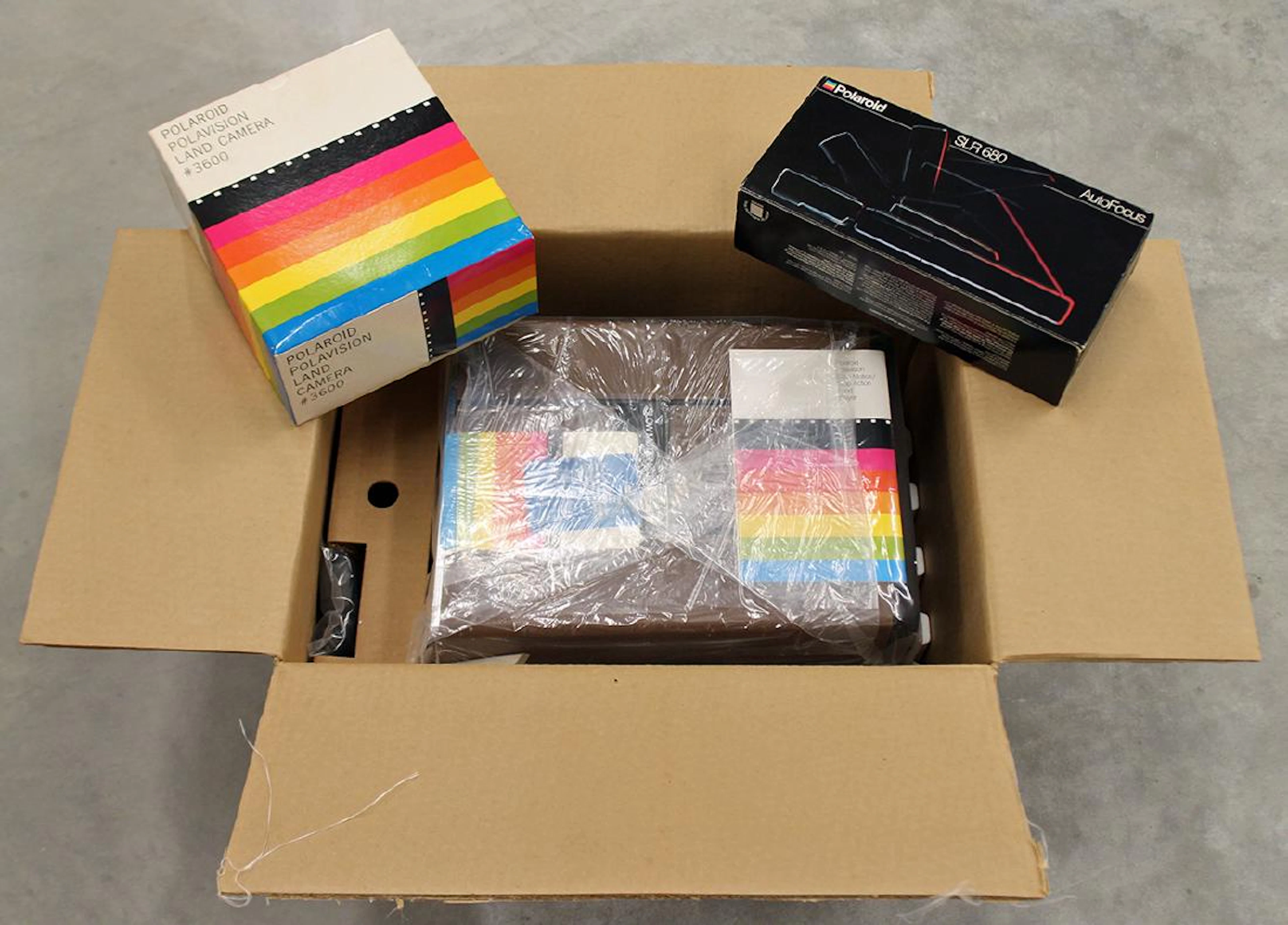 Polaroid cameras & polavision player