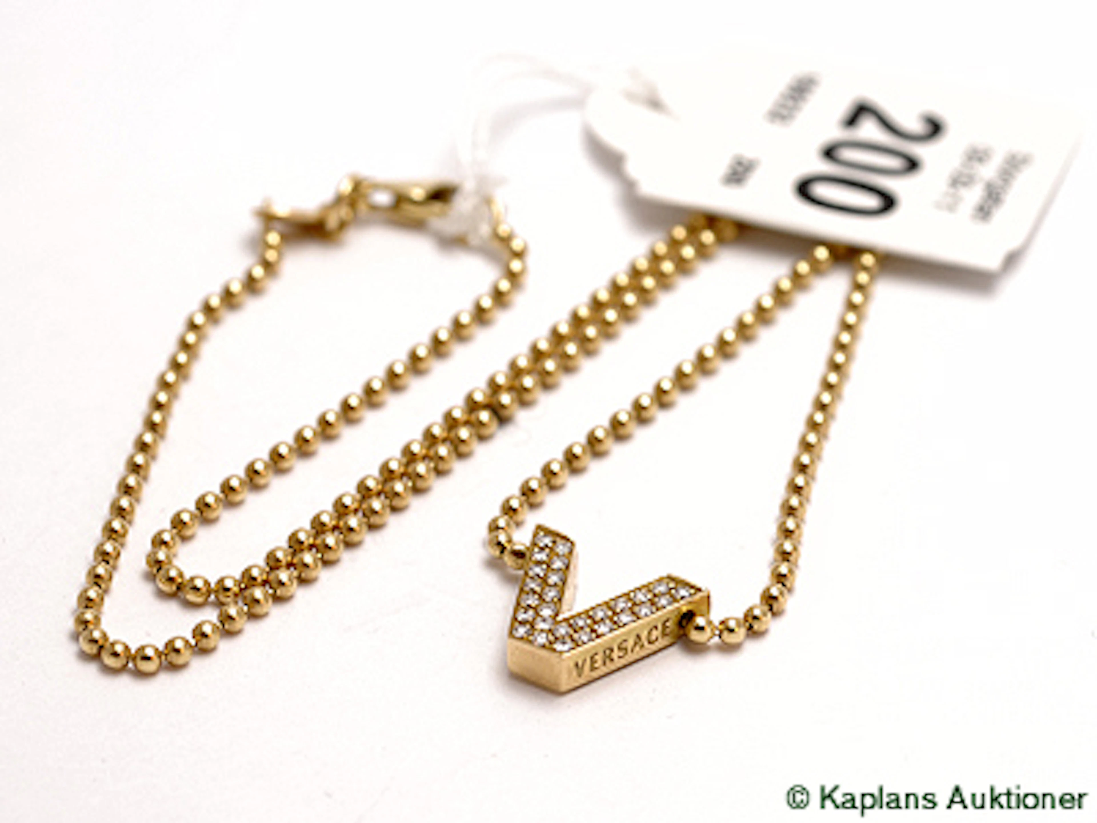 Collier 18K ca 42cm med diamanter 27x0,01ct "Versace" & etui