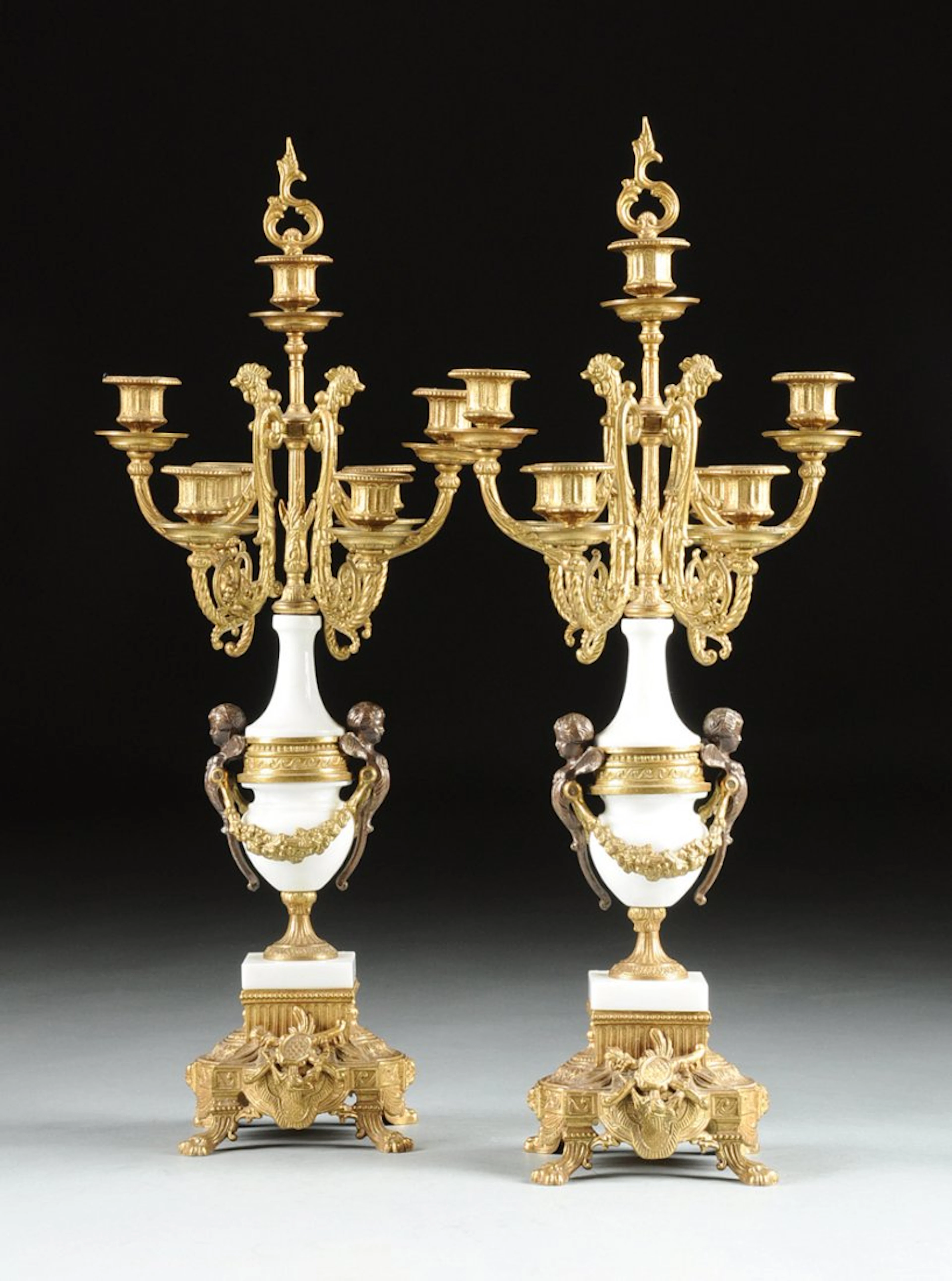 A pair of napoleon iii style gilt and patinated brass
