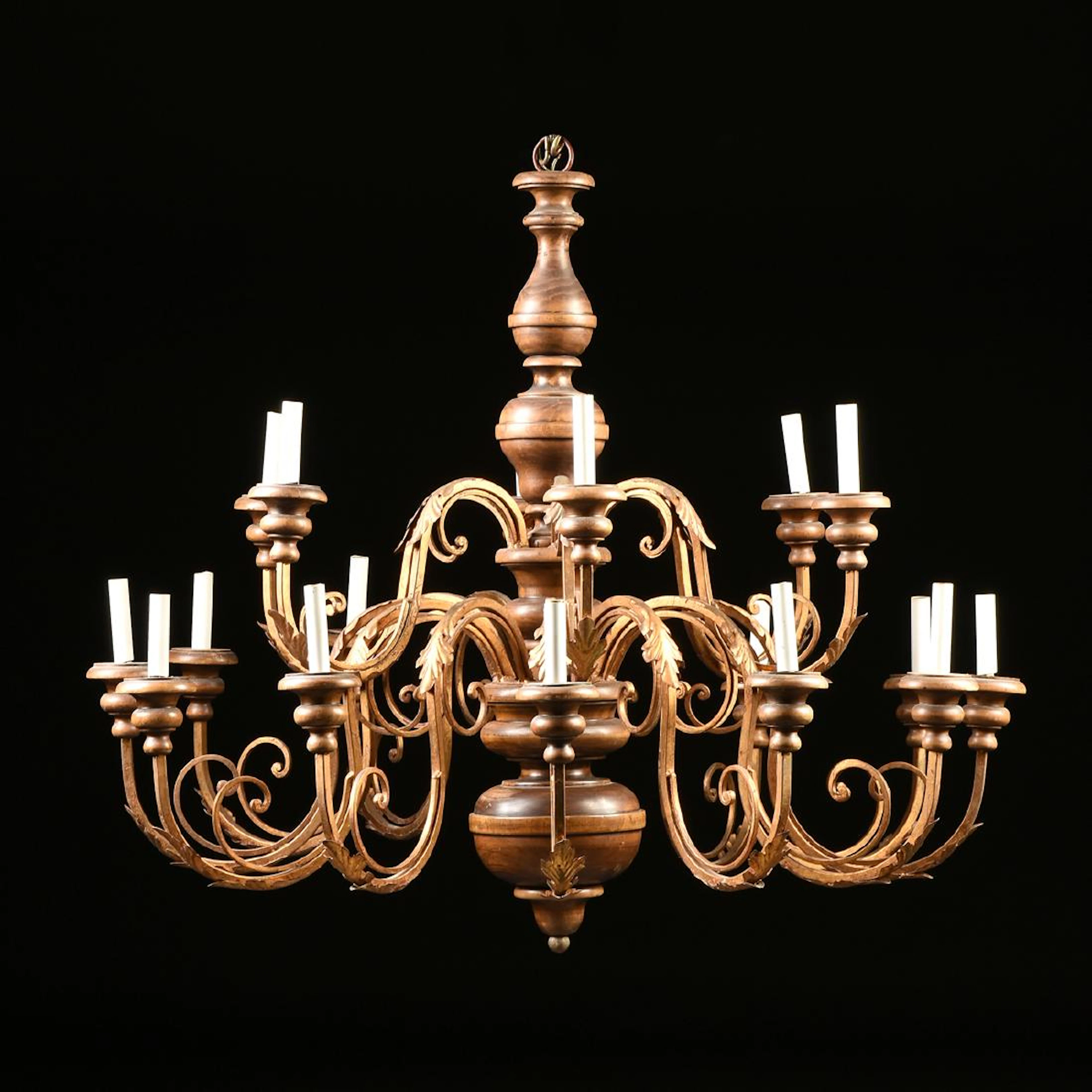 A mediterranean style wood and gilt wrought iron