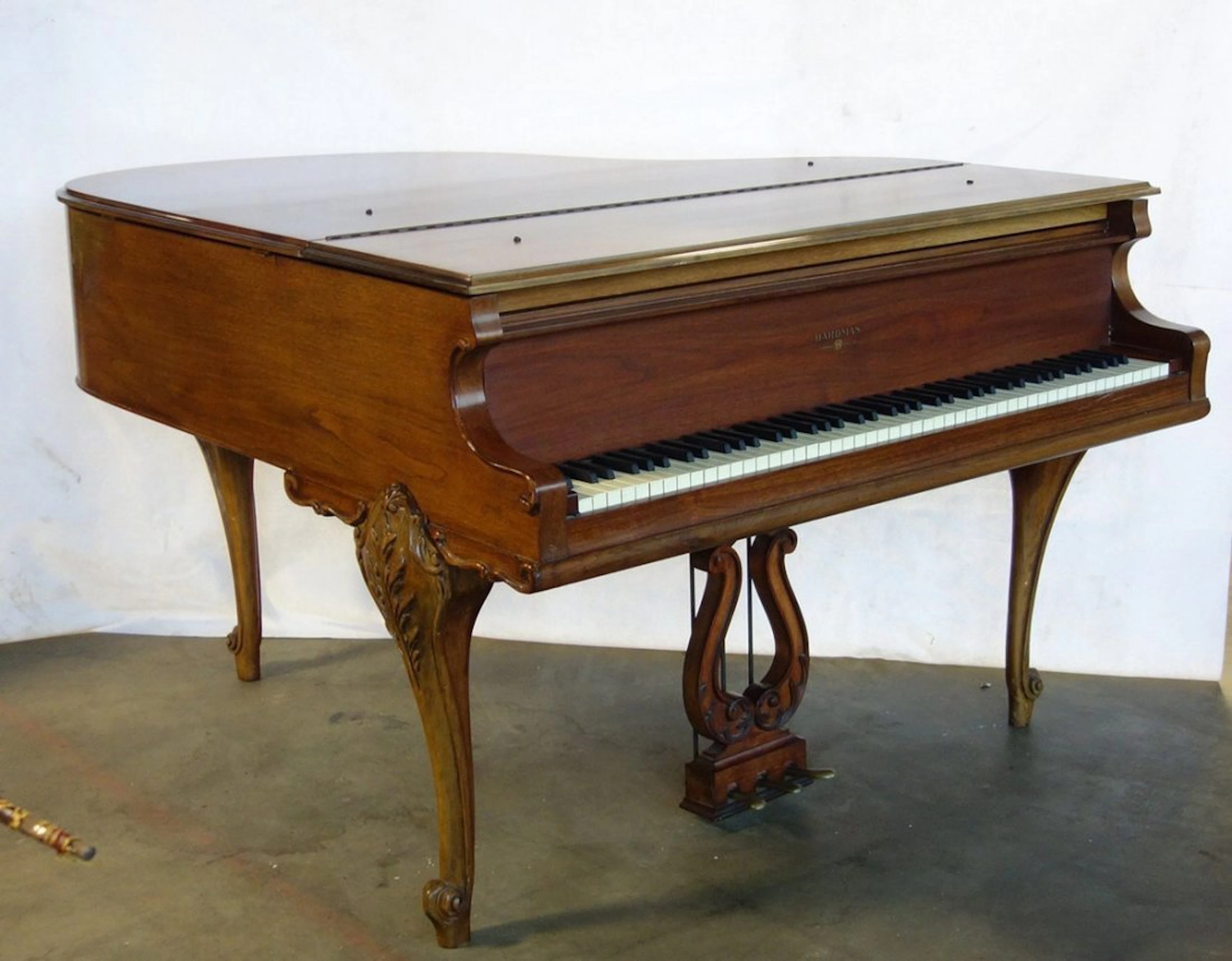 Hardman fruitwood baby grand piano in the French style