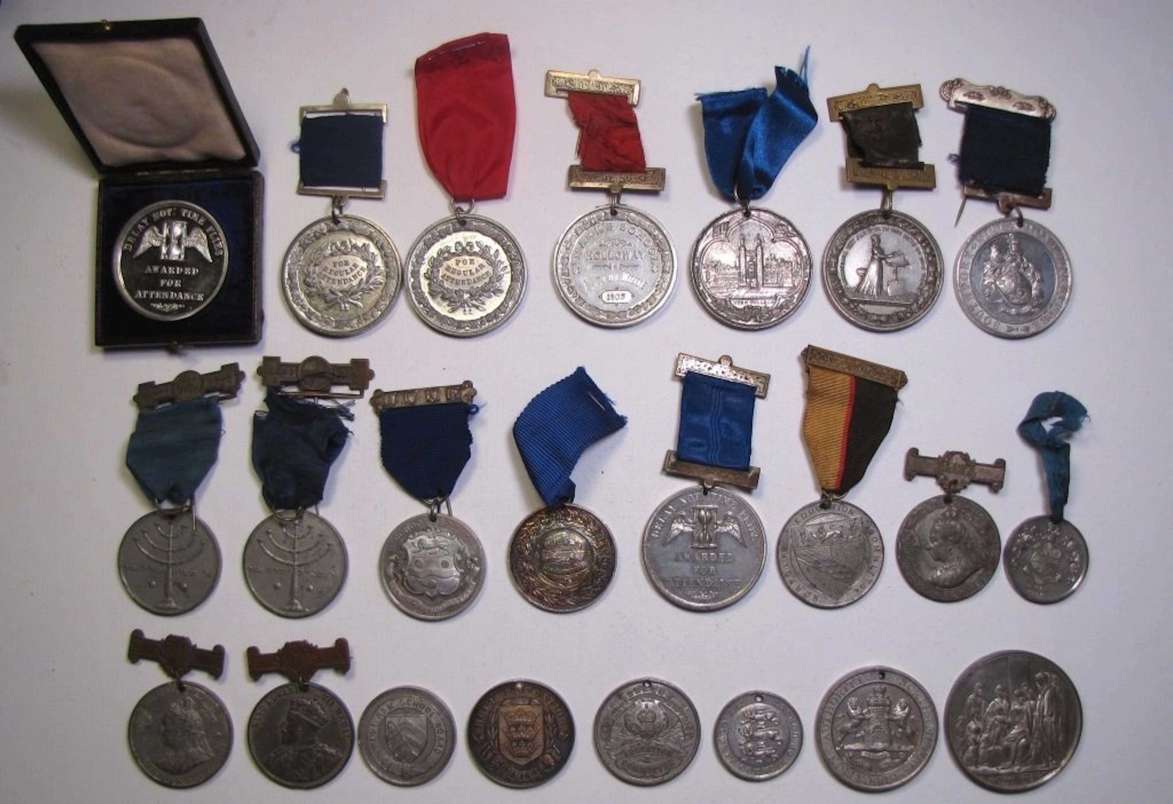 Group of 23 British School Attendance Medals