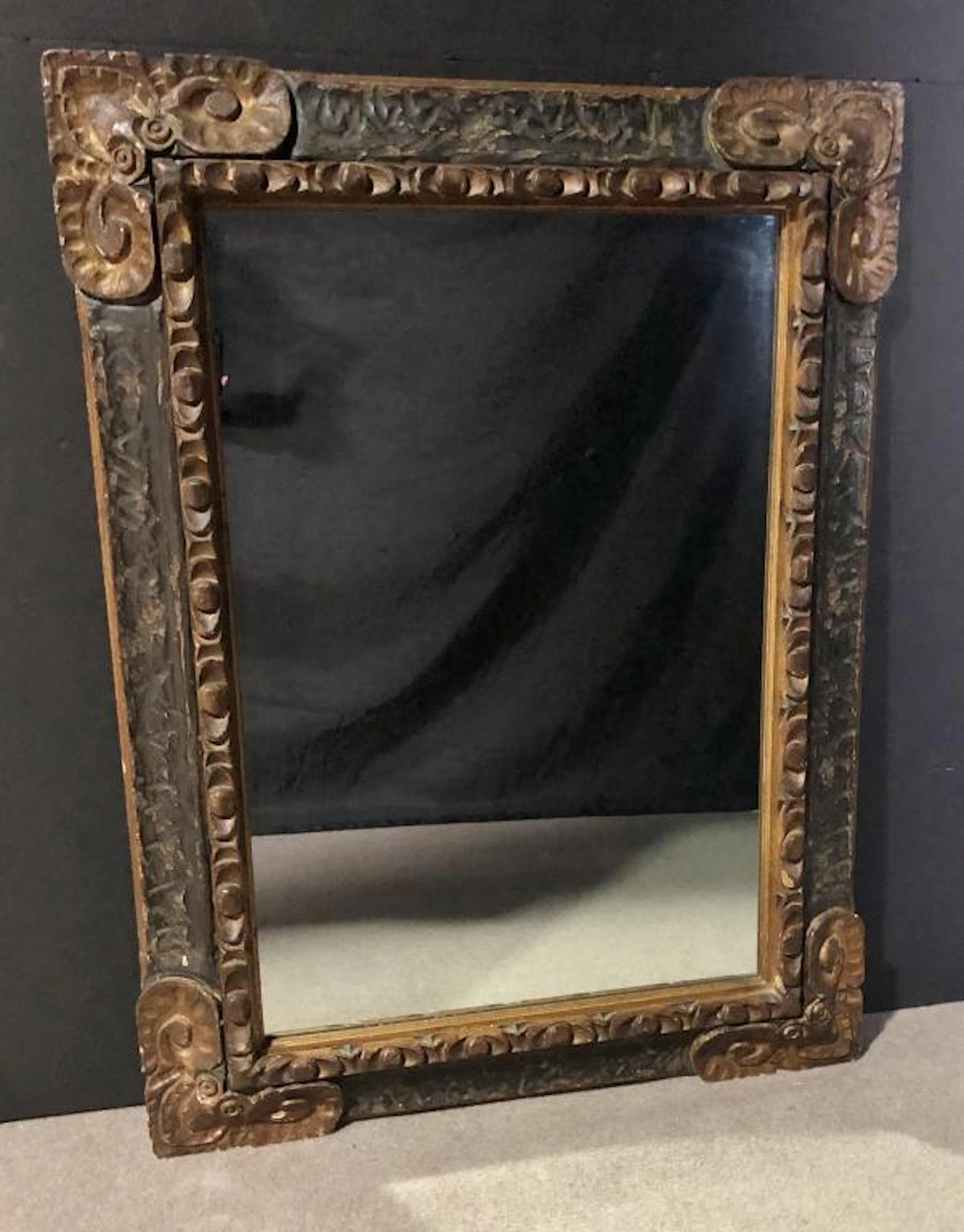 Mediterranean Carved Ebonized & Gilt Wood Mirror