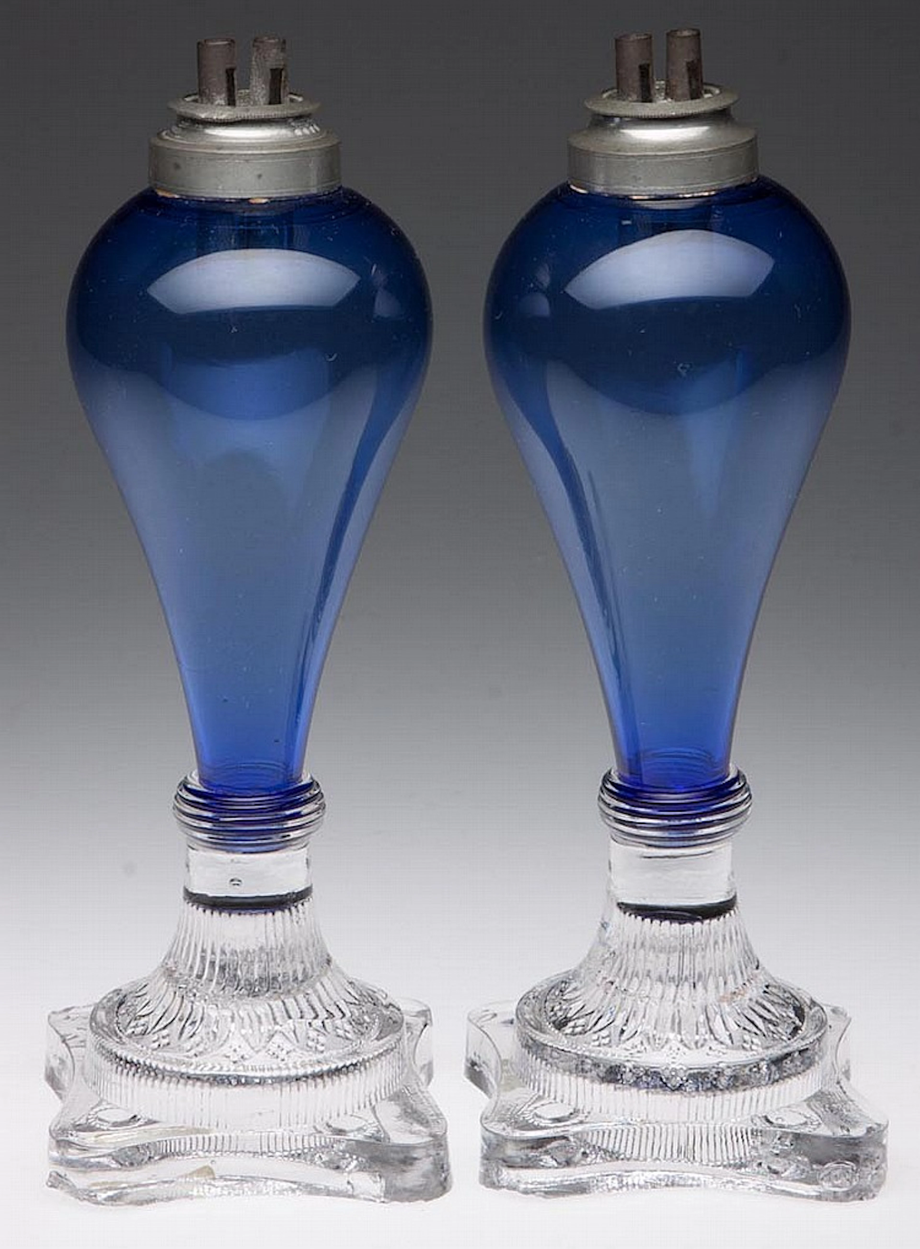 PAIR OF FREE-BLOWN AND PRESSED WHALE OIL STAND LAMPS