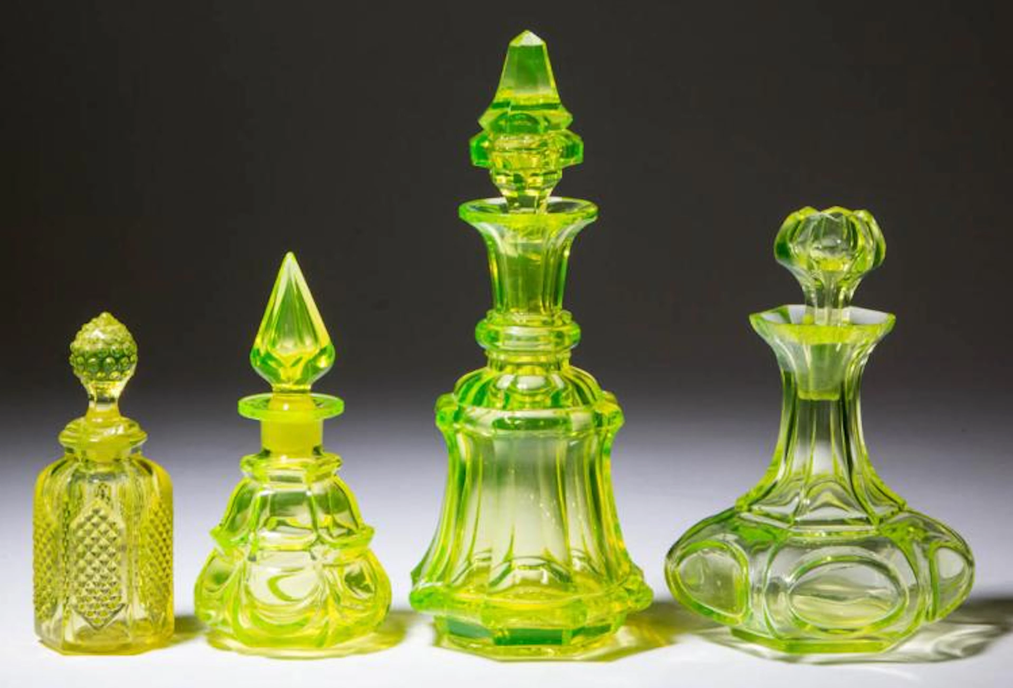 ASSORTED BLOWN-MOLDED / PRESSED COLOGNE BOTTLES, LOT OF FOUR
